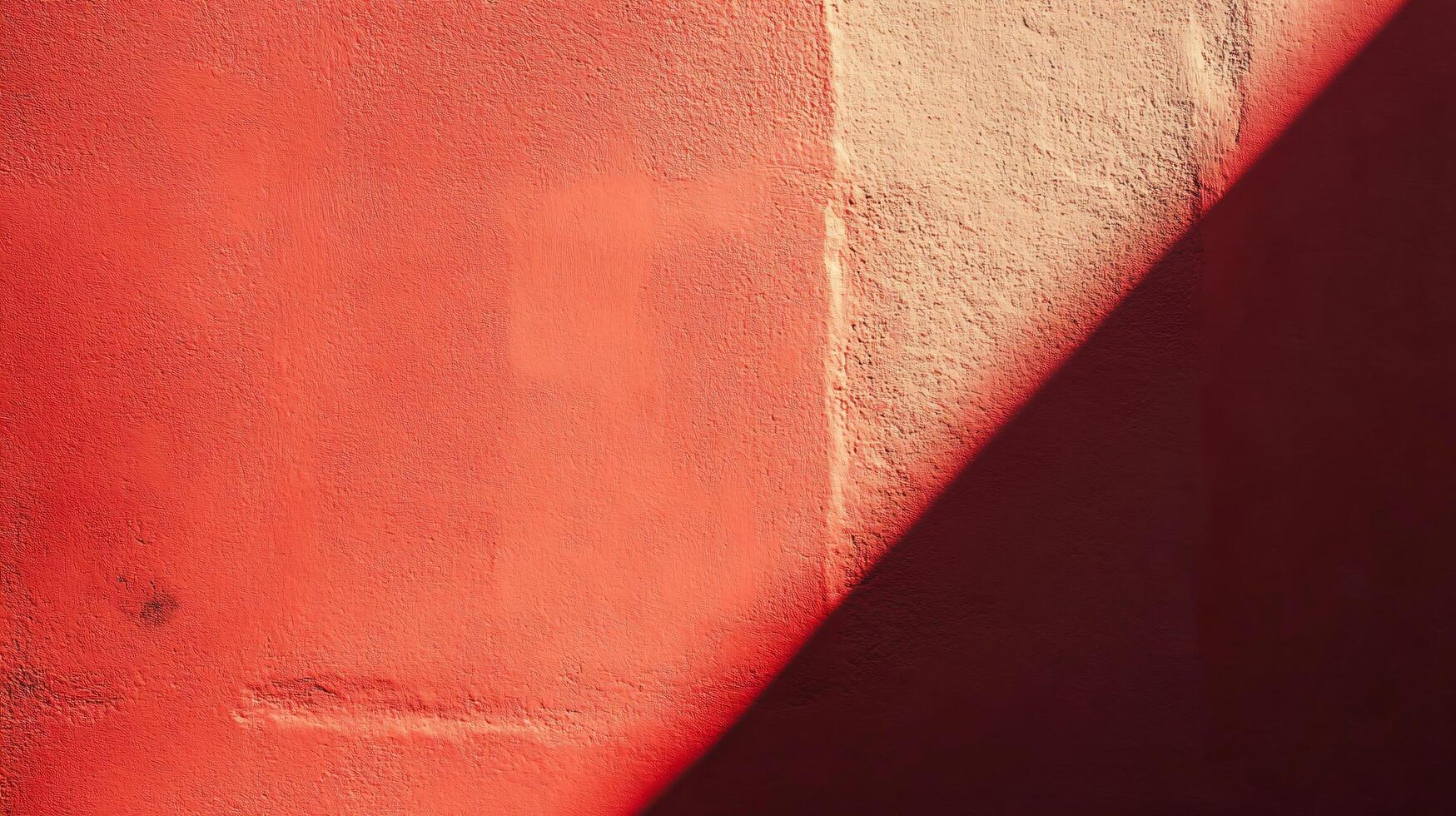 Red wall with a shadow on it. photo
