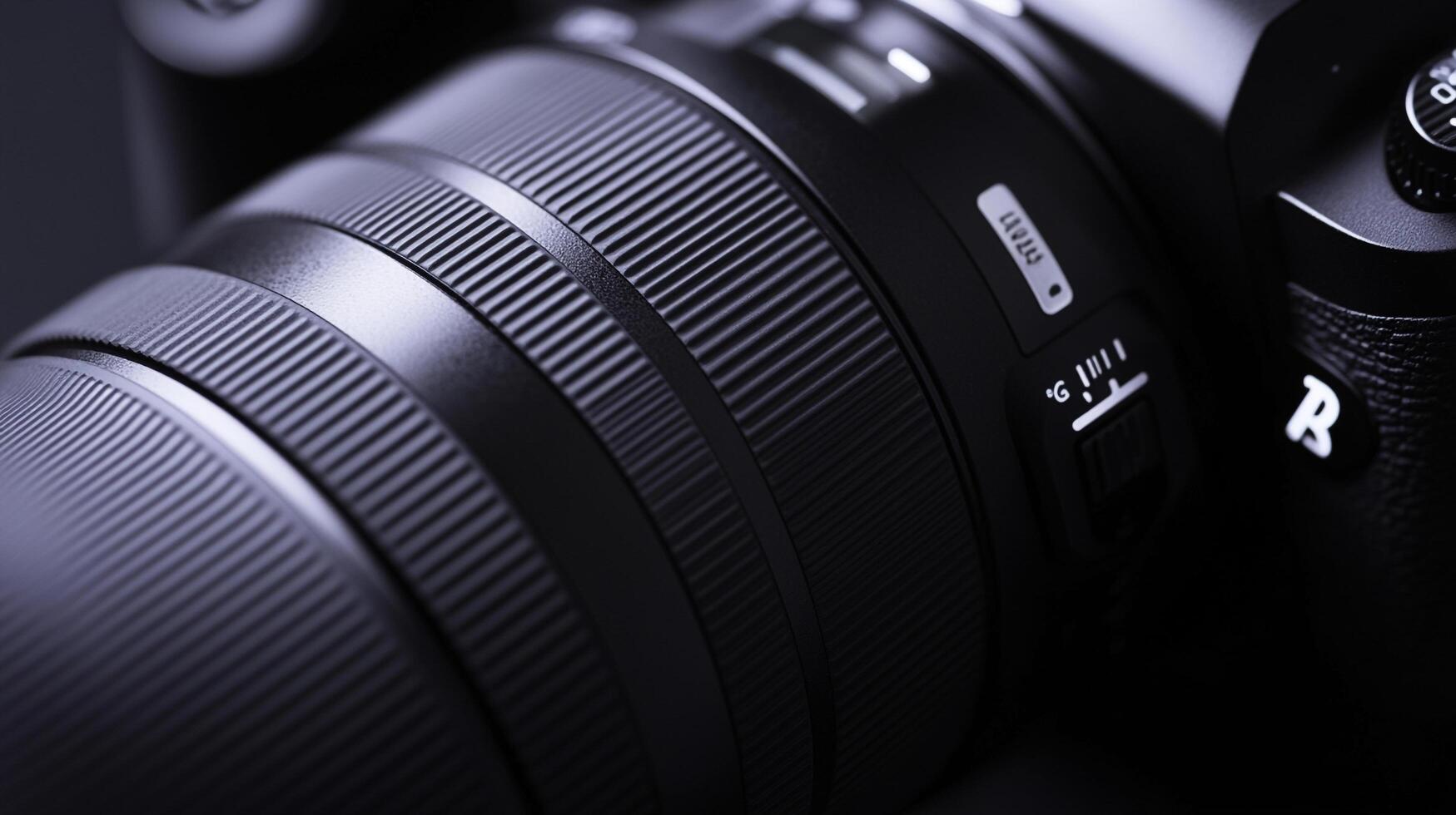 Close-up of camera lens highlighting its intricate design and focus. Professional photography equipment shown in detail. photo