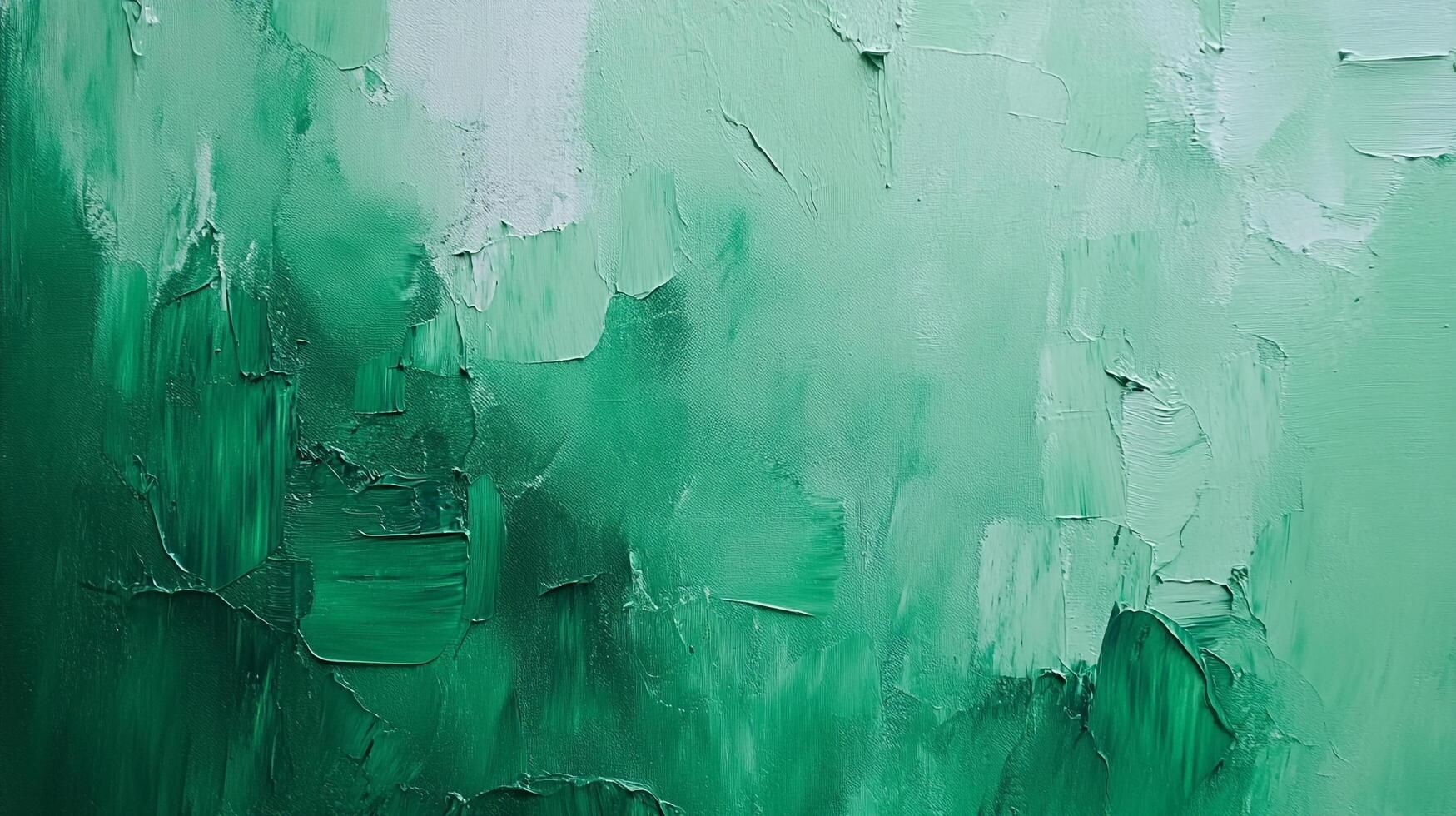 Abstract painting features an ombre of various green tones created with heavily textured brushstrokes, evokes feelings of nature and depth. photo