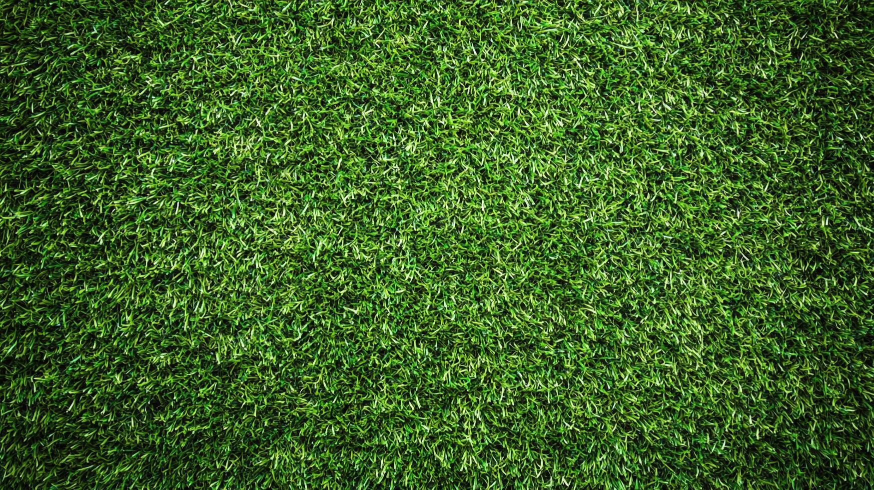 Lush green artificial turf creates a vibrant, low-maintenance lawn alternative. Perfect for sports or decoration, and can be used anywhere. photo