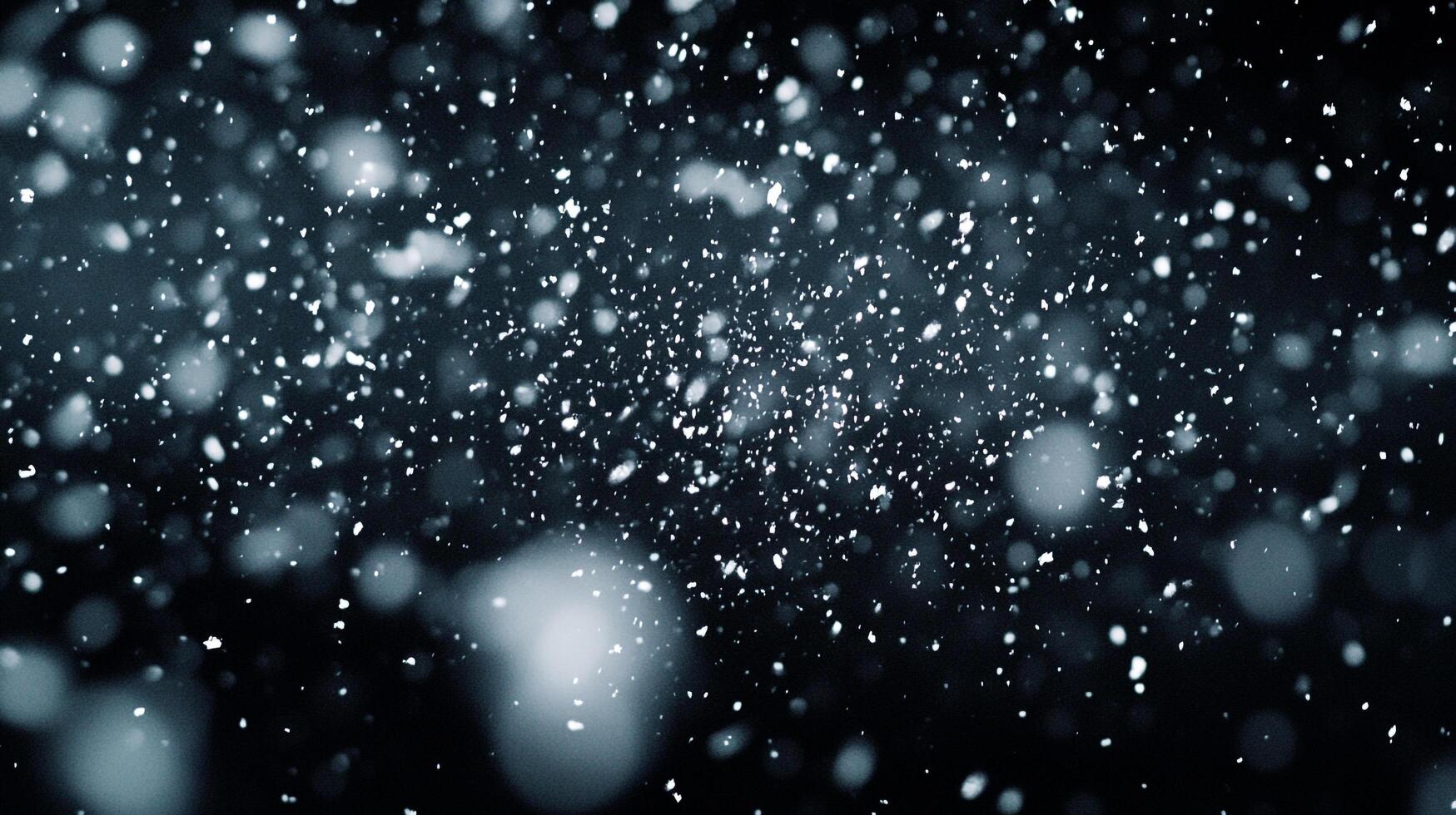 A flurry of snow falls gently against a dark backdrop, creating a serene and wintery scene filled with a sense of peaceful stillness. photo