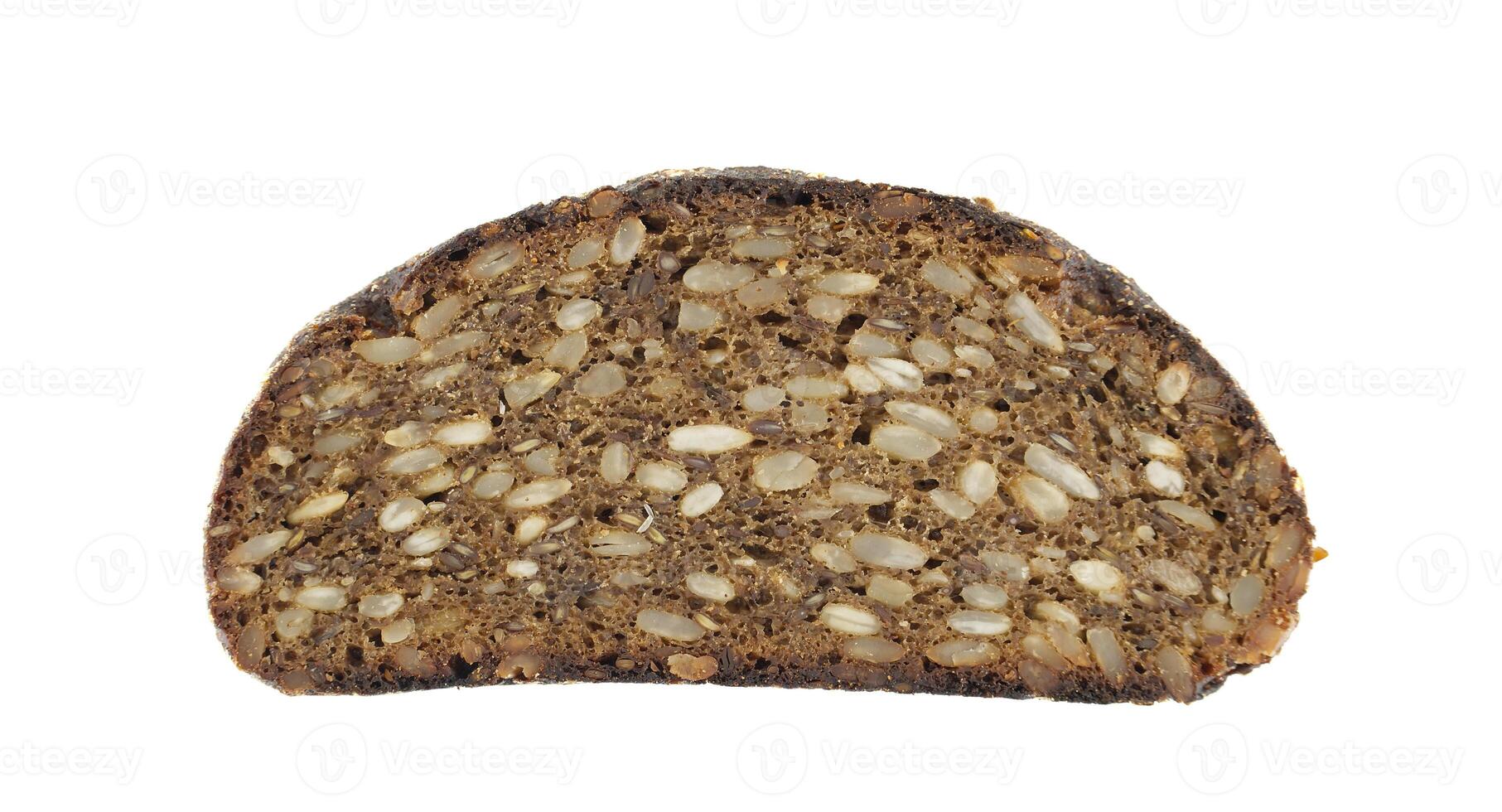A detailed view of a slice of dark seeded bread shows its rich texture and wholesome nature. photo