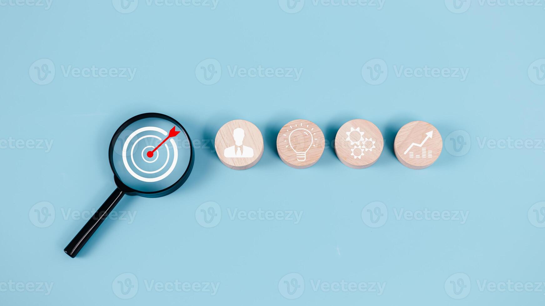 Business goals and objective concepts, Goal and target, Success and business target concept, Project management, Company strategy, Magnifying glass focus to target objective with icon action plan. photo