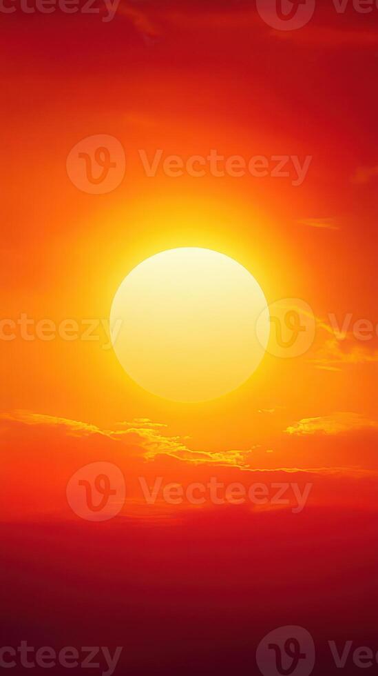 Breathtaking sunset with vibrant orange and yellow hues illuminating the sky over a tranquil landscape at dusk photo