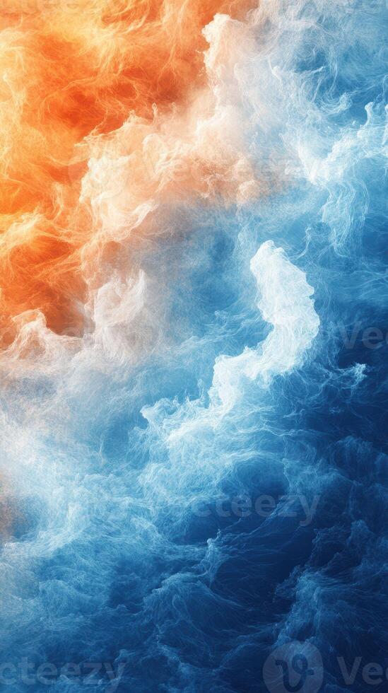 Colorful swirling vapor in vibrant orange and blue tones creating a dramatic abstract effect photo
