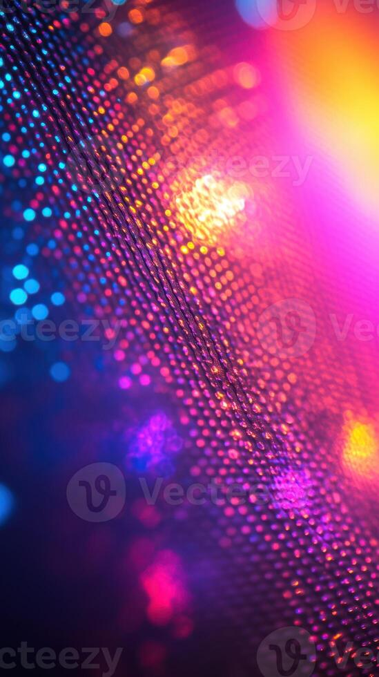 Vibrant color patterns shimmer in mixed lighting at a night event with festive atmosphere photo