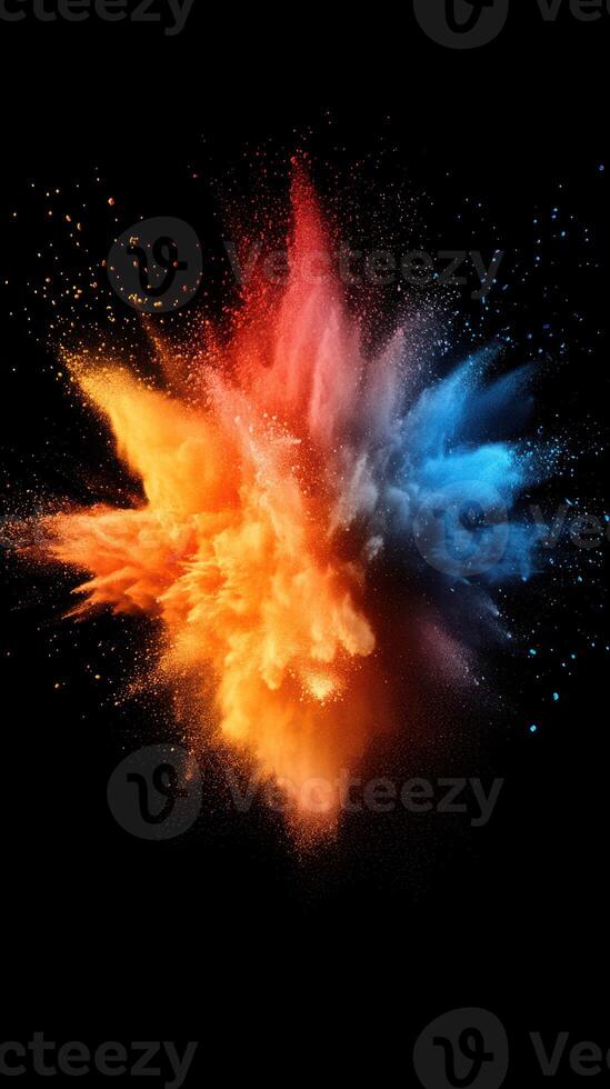 Colorful explosion of orange and blue powder bursts against a black background creating dynamic visual impact photo