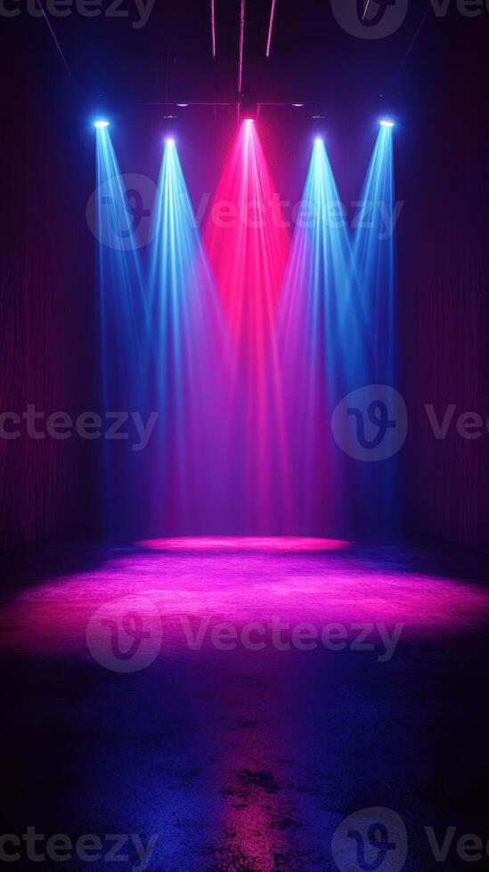 Colorful stage lighting creates an energetic atmosphere in a dimly lit venue at night photo