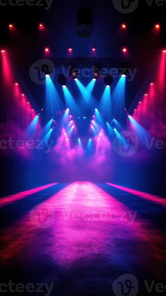 Colorful stage lights illuminate a dramatic performance area with vibrant hues creating an energetic atmosphere photo