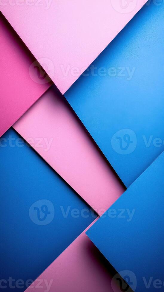 Colorful paper layers arranged in geometric patterns create an artistic background in shades of blue and pink photo