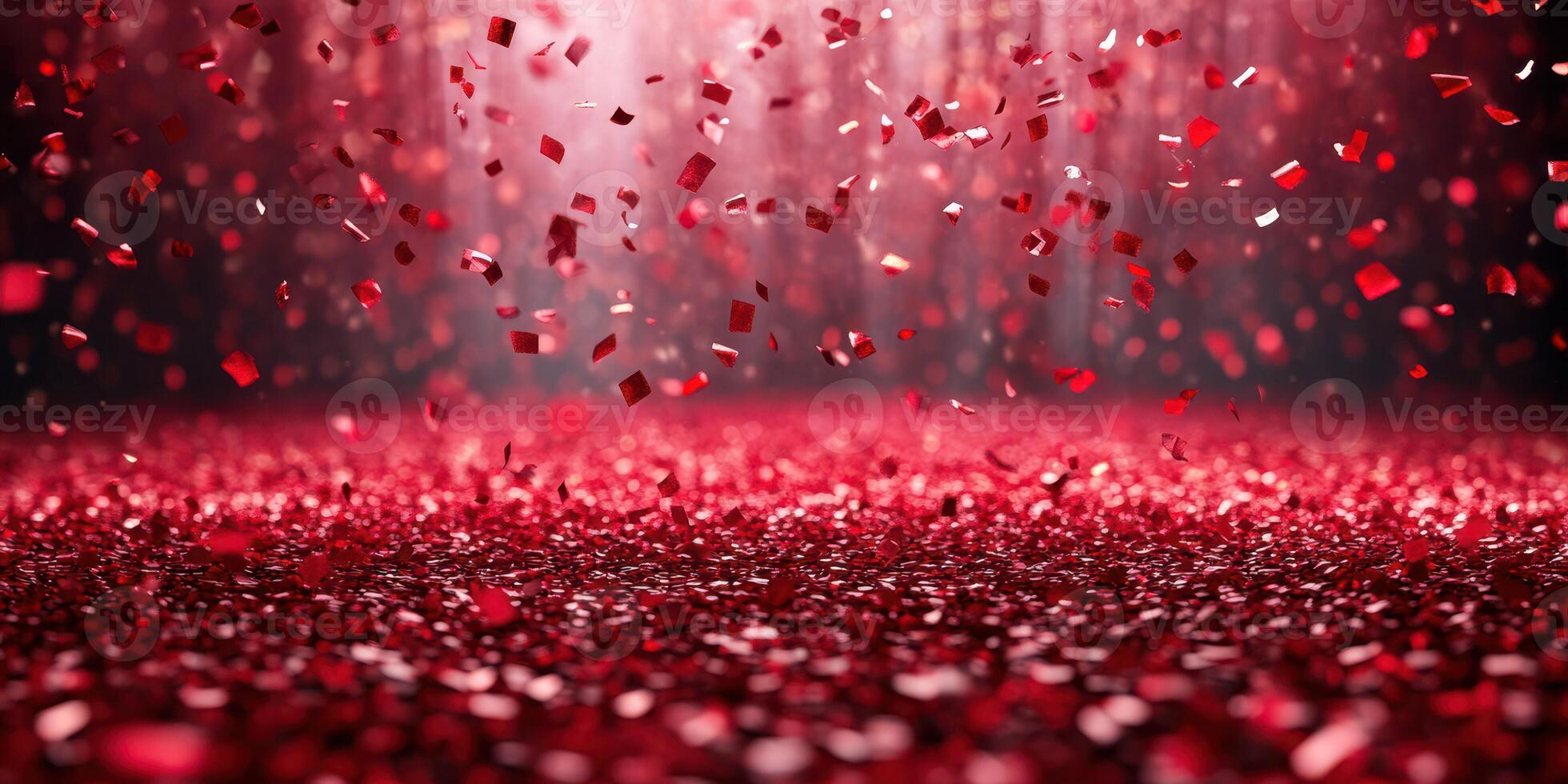 Vibrant red confetti falling gracefully on a sparkling surface during a festive celebration at night photo