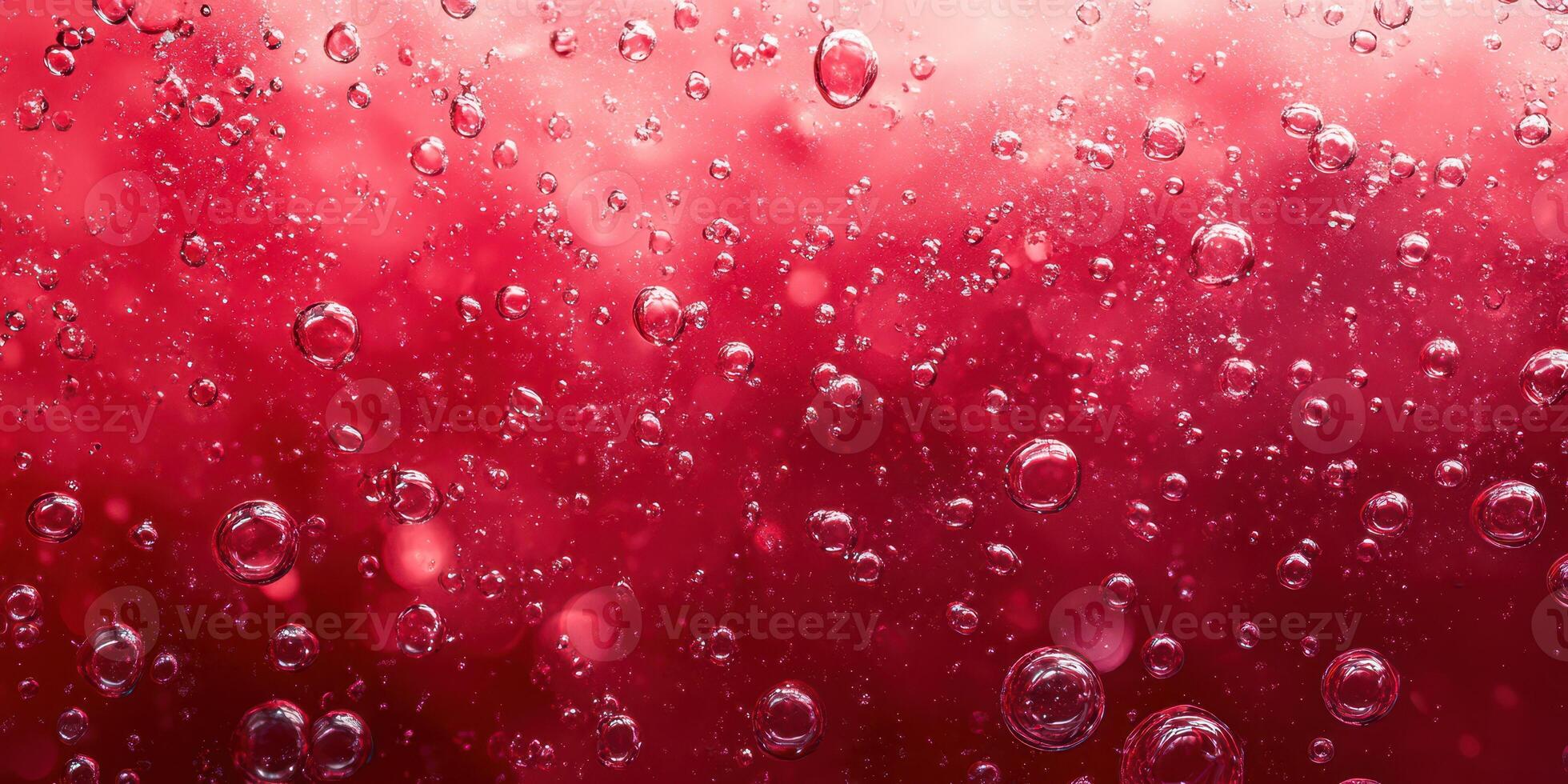 Bubbles rising in vivid red liquid creating an abstract and colorful background effect in a creative art setup photo