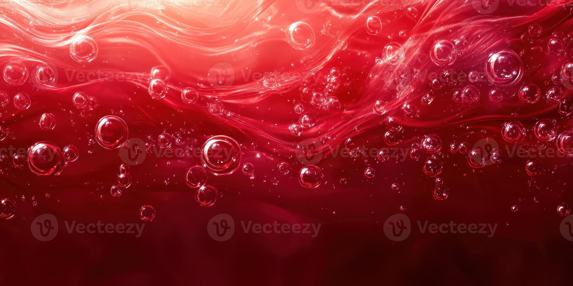 Bubbles rise in a rich red liquid creating an enchanting, textured display of movement and color photo