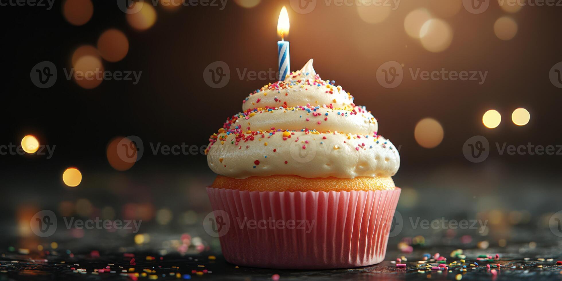 Colorful cupcake with a single candle lit, showcasing a festive celebration during a special occasion photo