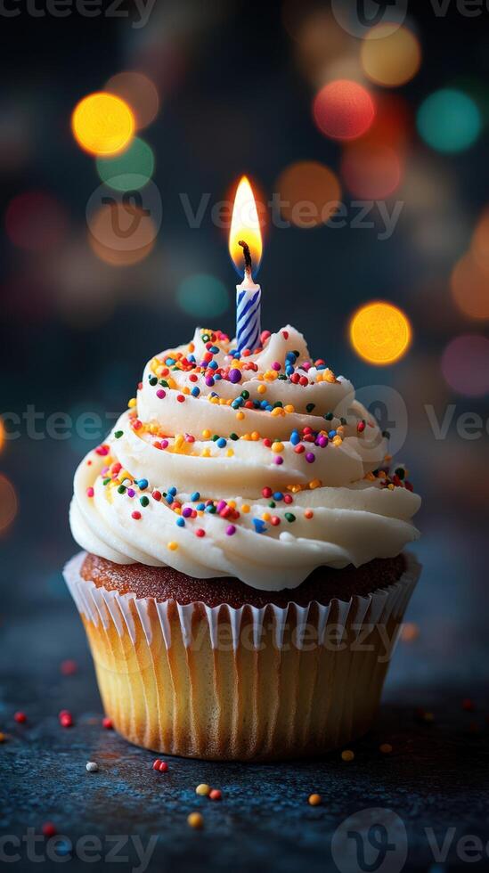Delicious cupcake with colorful sprinkles and a lit candle celebrating a joyful occasion in a festive atmosphere photo