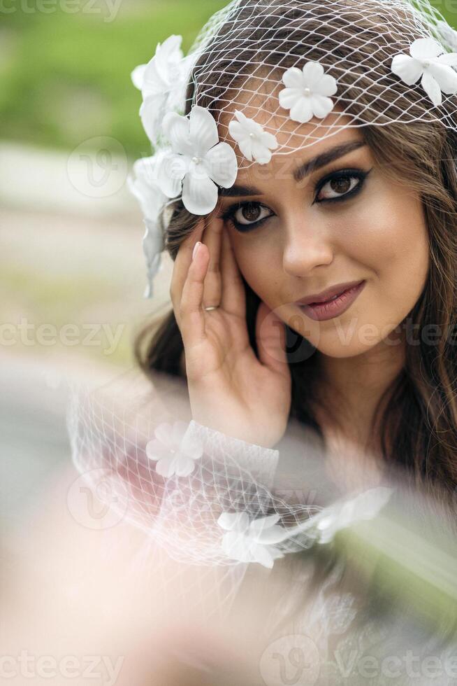 portrait of a young woman with floral veil, showcasing natural beauty, smooth skin texture, and elegant features in a romantic and artistic style, emphasizing timeless aesthetics and delicate . High quality photo
