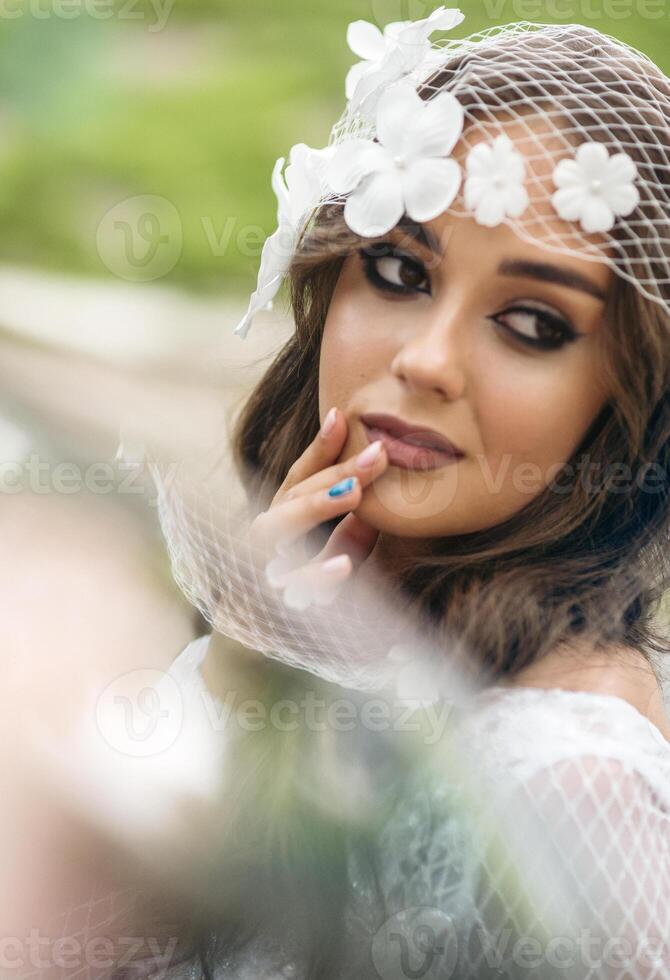 portrait of a young woman with floral veil, showcasing natural beauty, smooth skin texture, and elegant features in a romantic and artistic style, emphasizing timeless aesthetics and delicate .High quality photo