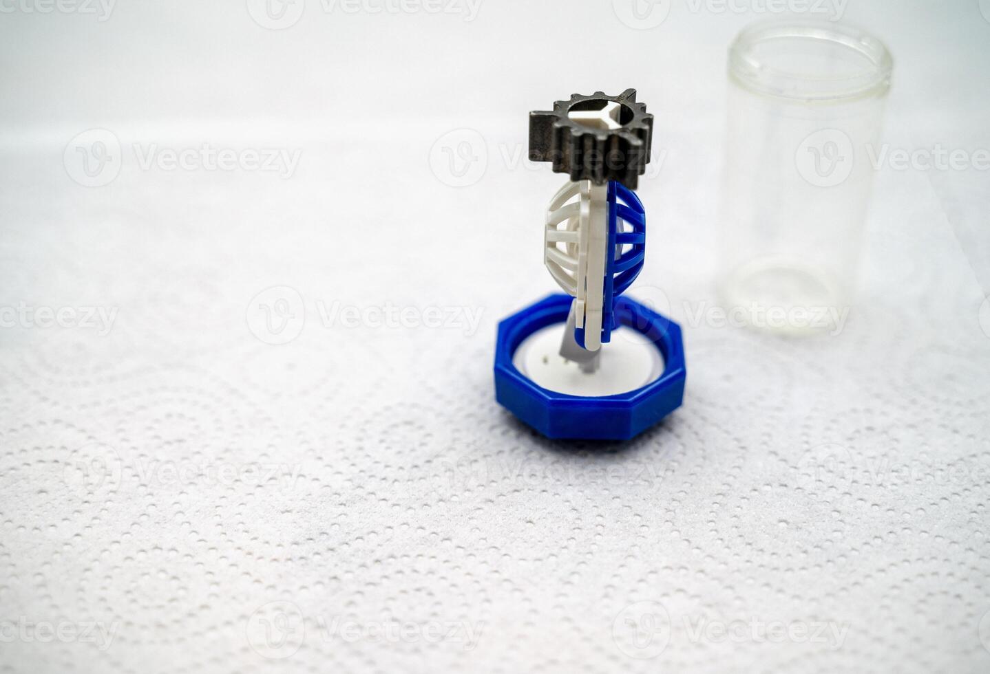 container for cleaning and storing contact lenses for eyes, used at home. For soft and hard lenses. the container consists of two parts, the first part for lenses, the second part for liquid photo