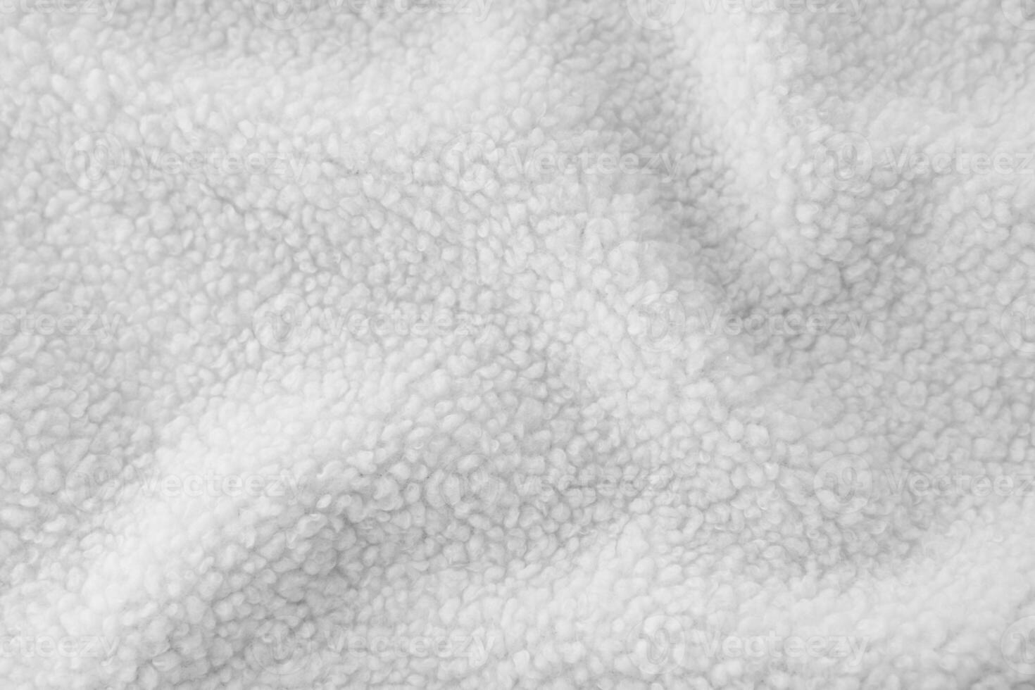 Soft and cozy white sherpa fleece fabric made from recycled polyester photo