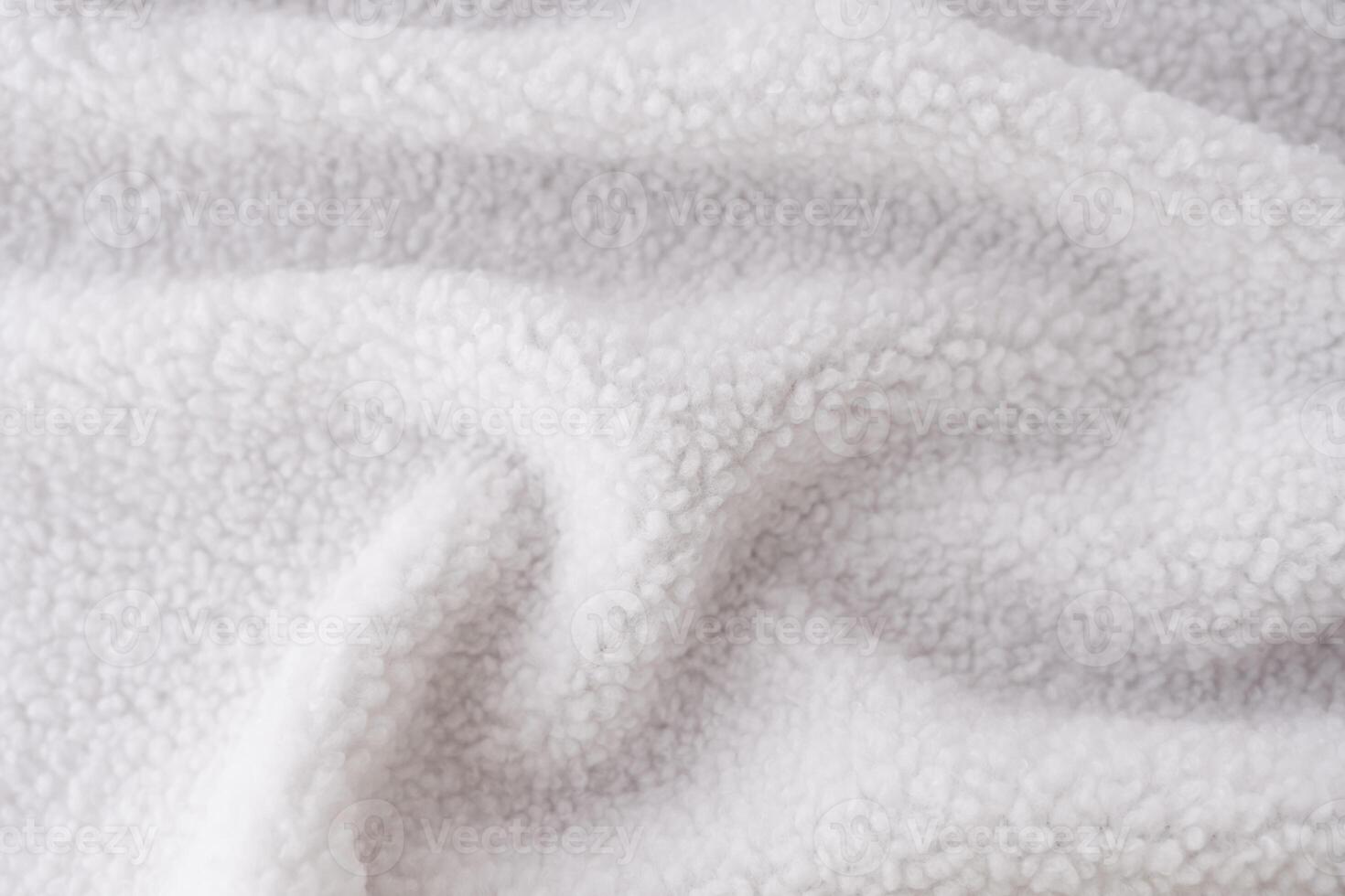 White sherpa fleece fabric texture made from recycled polyester photo