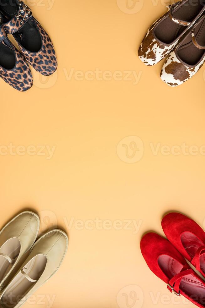 Assorted spring fashion ballet flats in vibrant and apricot tones with copy space. photo