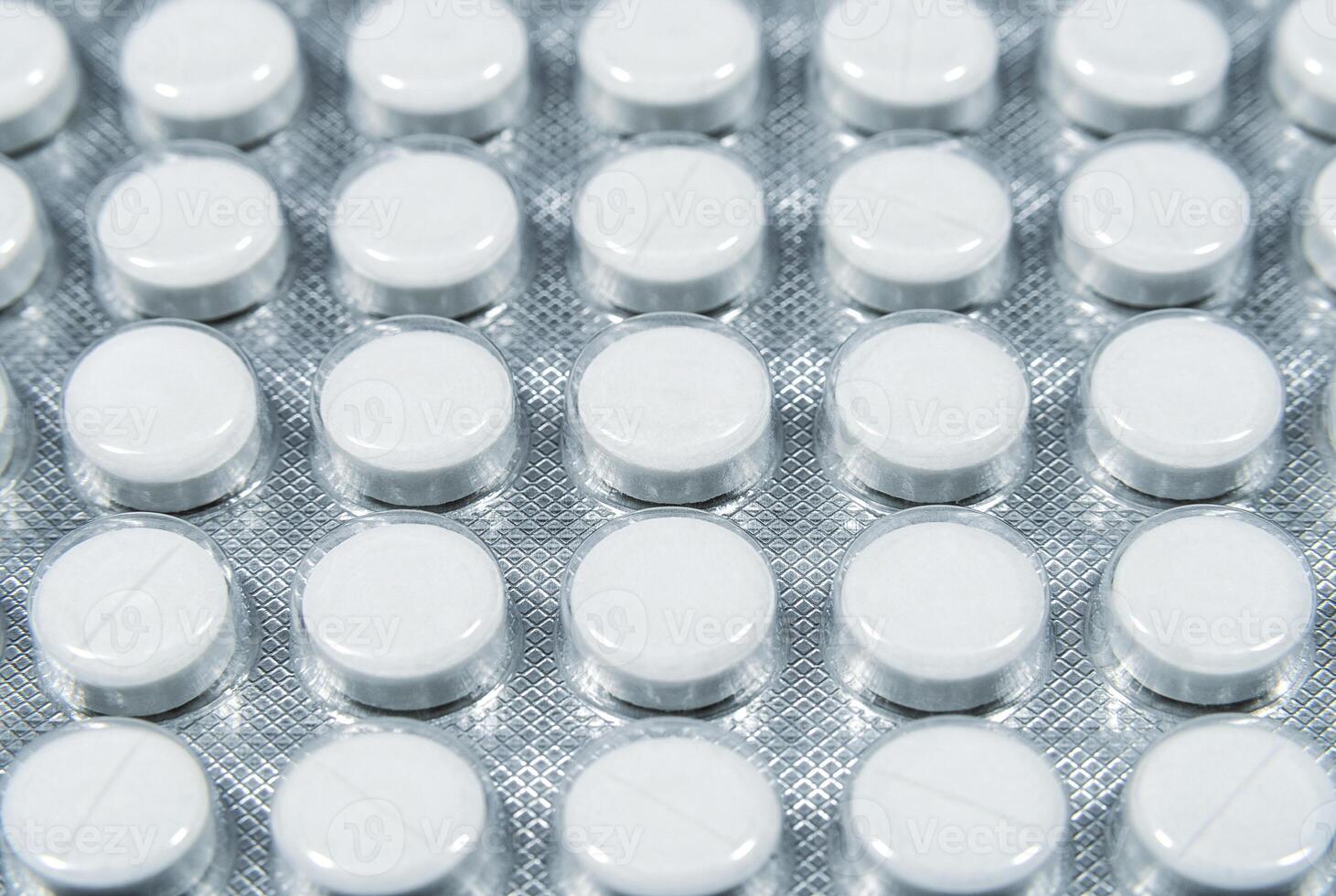 Blister pack of white round tablets photo
