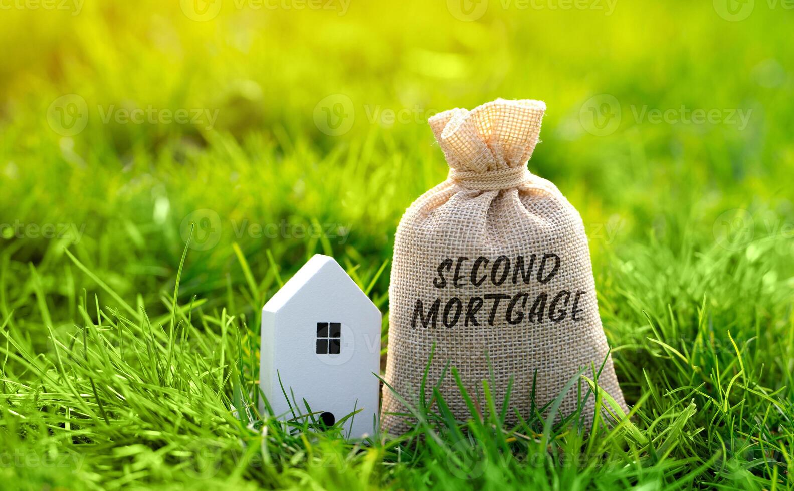 Second mortgage concept. Type of mortgage loan that is taken out on a property that already has a first mortgage. Real estate and finance photo