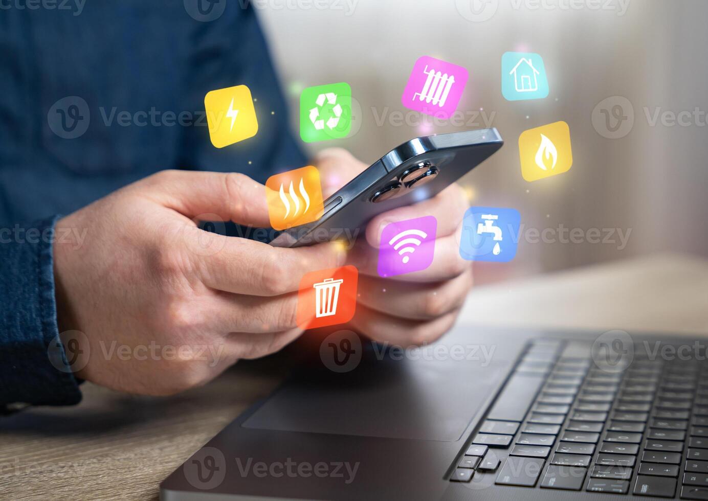 The man pays household bills for services and utilities via phone or internet. Online payment. Electricity, water, garbage collection, internet. Expenses, budgeting, and cost of living. photo