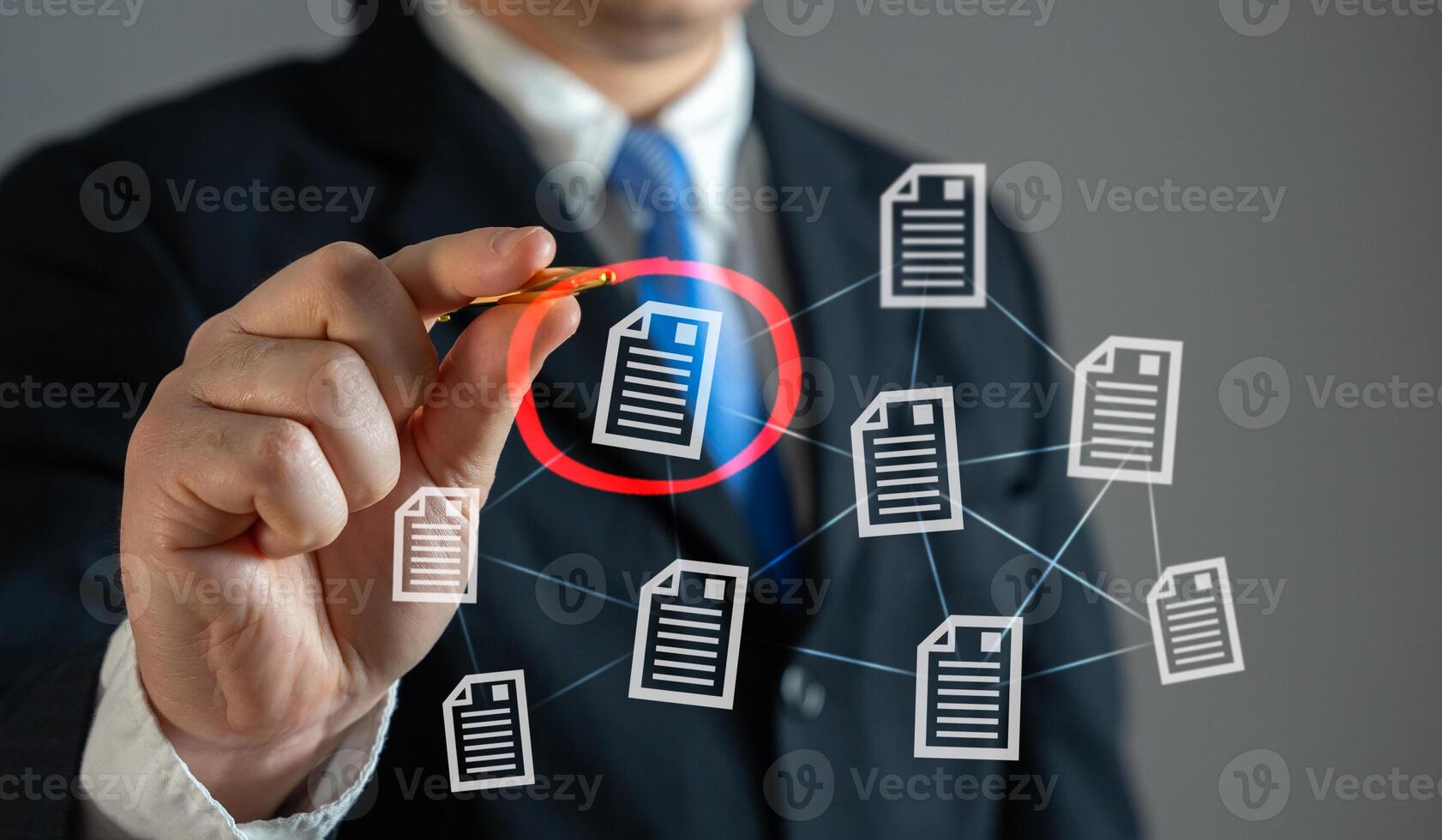 The businessman circles the required document in red. Importance, correction approvals. Urgent paperwork, or contract reviews. photo
