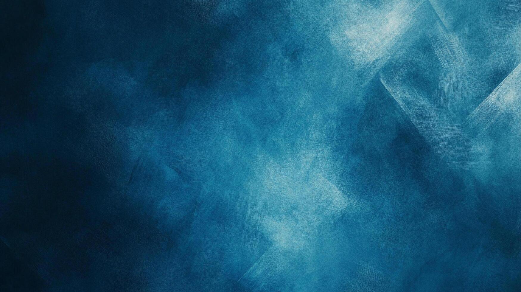 An abstract image with dark and light shades of blue, creating a textured and visually interesting background for various designs. photo