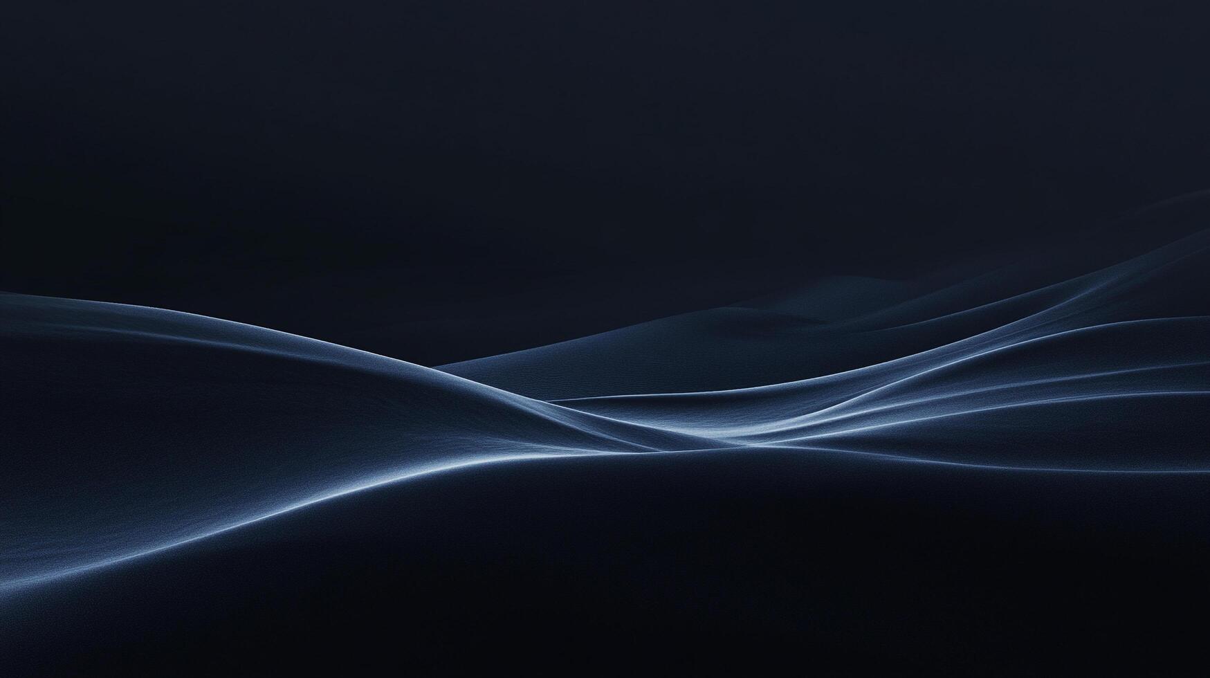 Waves of soft, blue fabric cascade in darkness, creating serene and flowing forms reminiscent of dunes under a starlit sky. photo