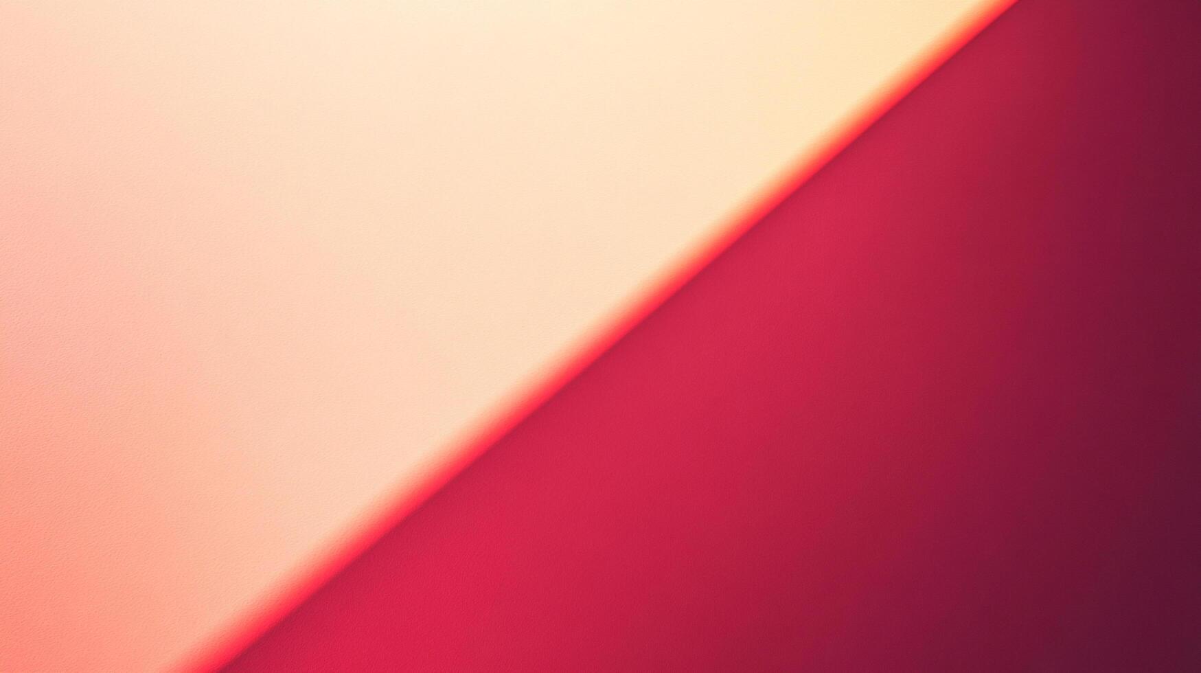 Abstract color field with soft gradient from pale orange to deep magenta, divided diagonally, evokes modern design and minimalist art. photo