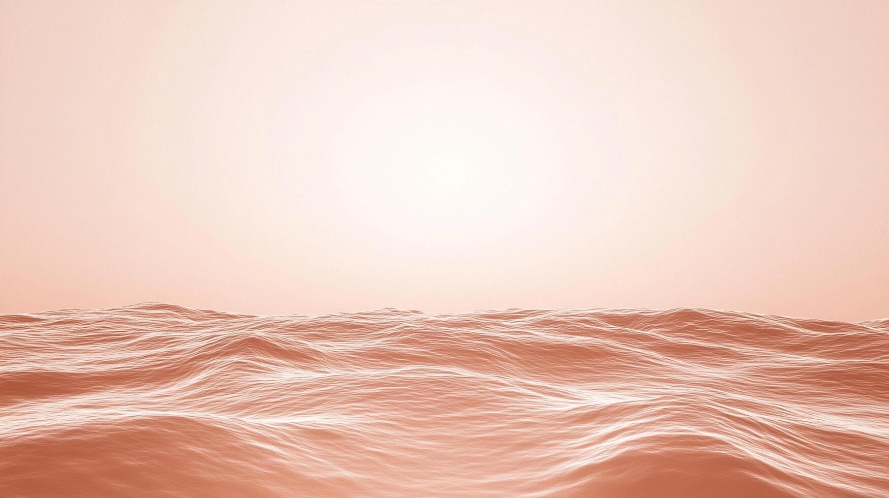 Gentle waves ripple across the frame, bathed in the soft glow of dawn, creating a serene waterscape. The horizon fades into a soft light. photo