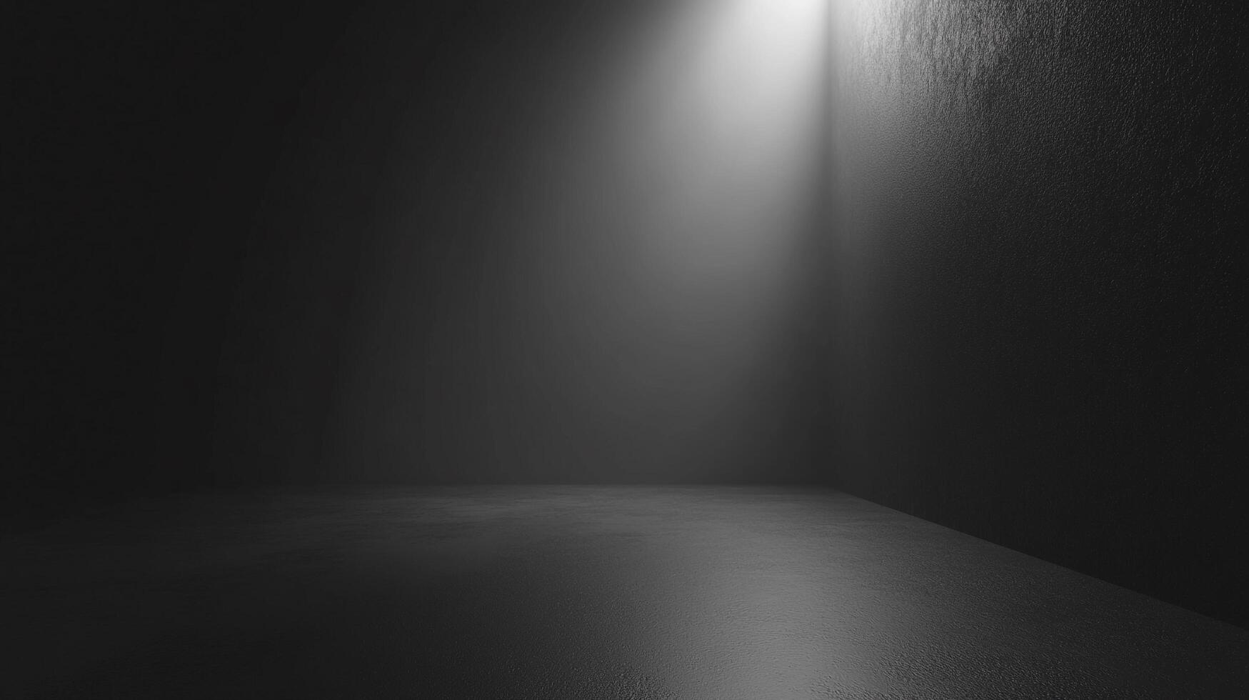 A stark spotlight illuminates a corner, casting light on the textured wall and smooth floor in a scene defined by monochrome contrast. photo