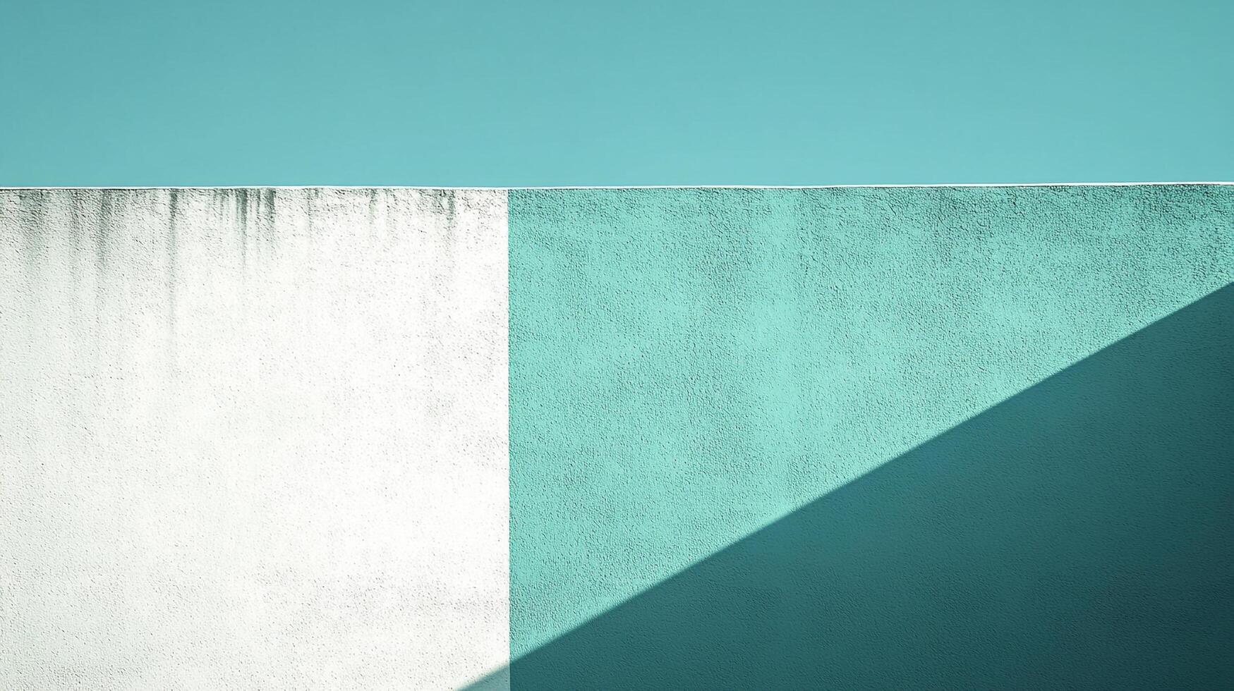 Geometric wall texture in aqua and white tones with a diagonal shadow creating a minimalist and modern aesthetic. Abstract background photo