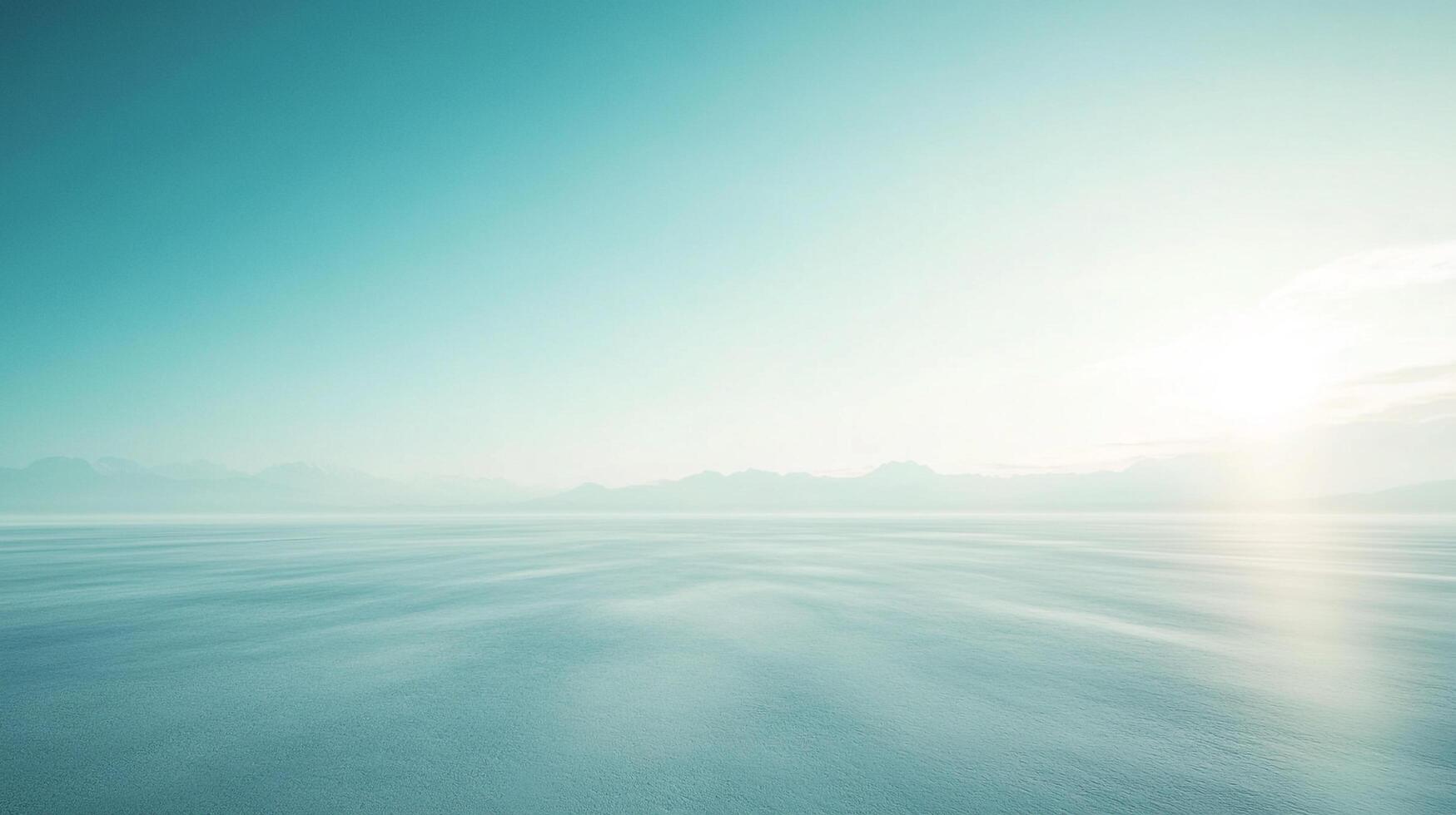 Vast expanse of tranquil blue water under a serene sky, distant mountains creating a peaceful horizon, reflecting sunlight. photo