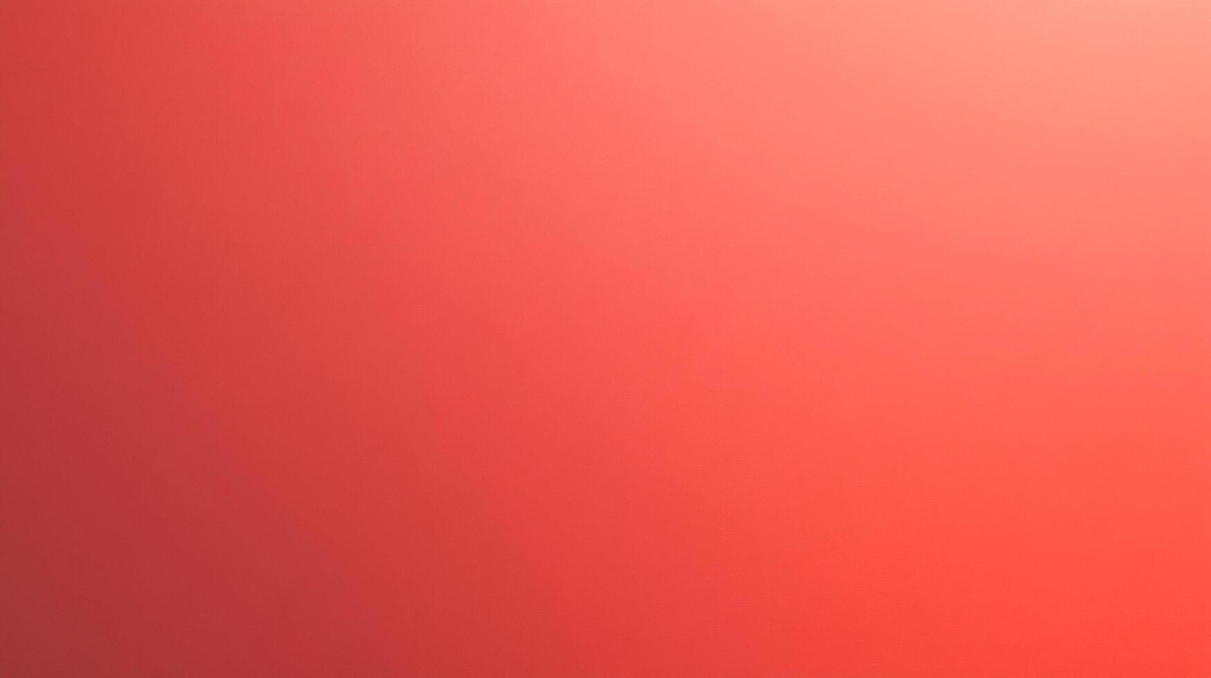 A visually stunning image showcases a gradient blend of warm red tones, transitioning smoothly from darker shades to a lighter, brighter hue. photo