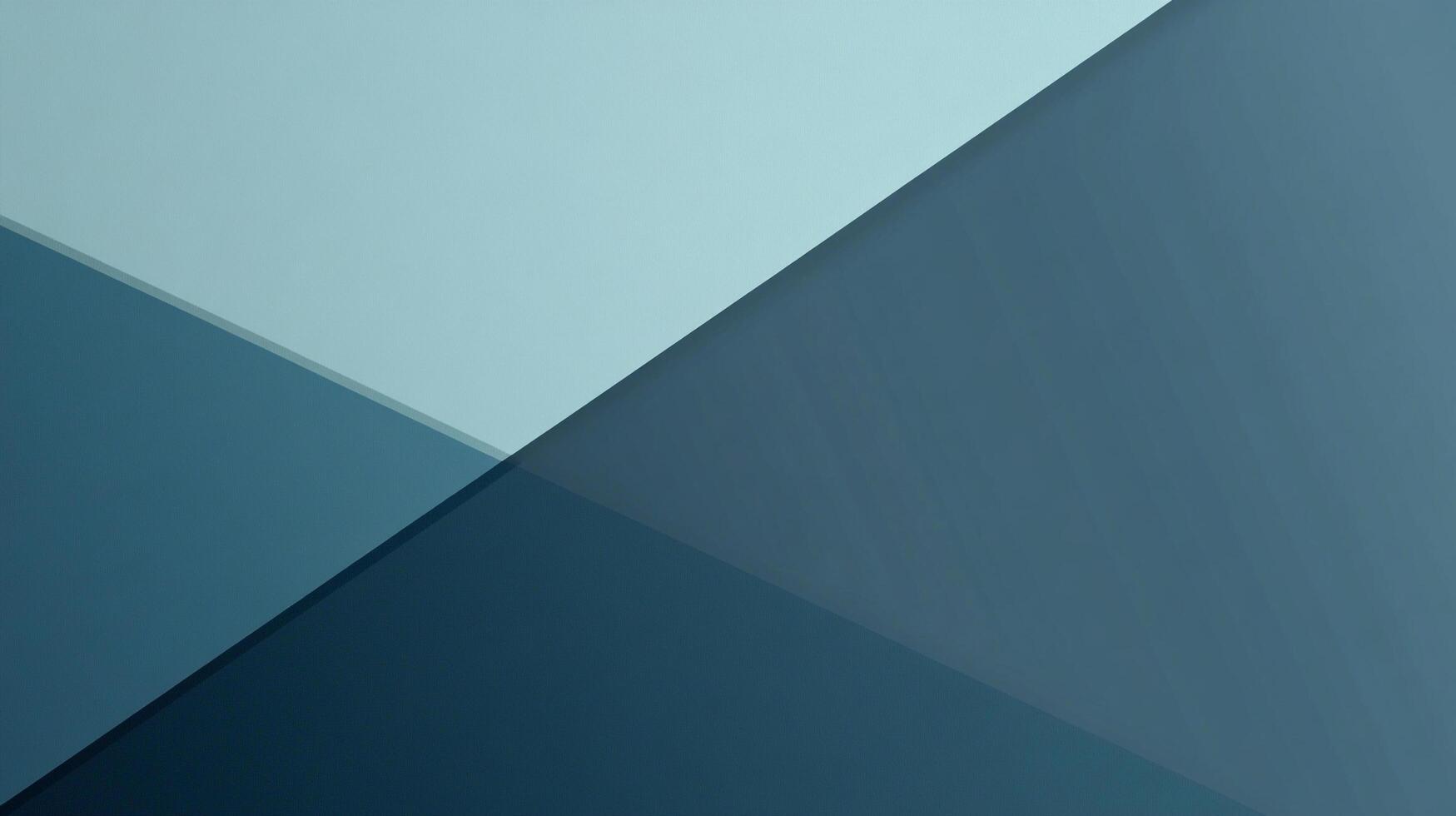 Geometric color field with varying shades of blue intersecting to form sharp lines and abstract shapes. Minimalist color design. photo