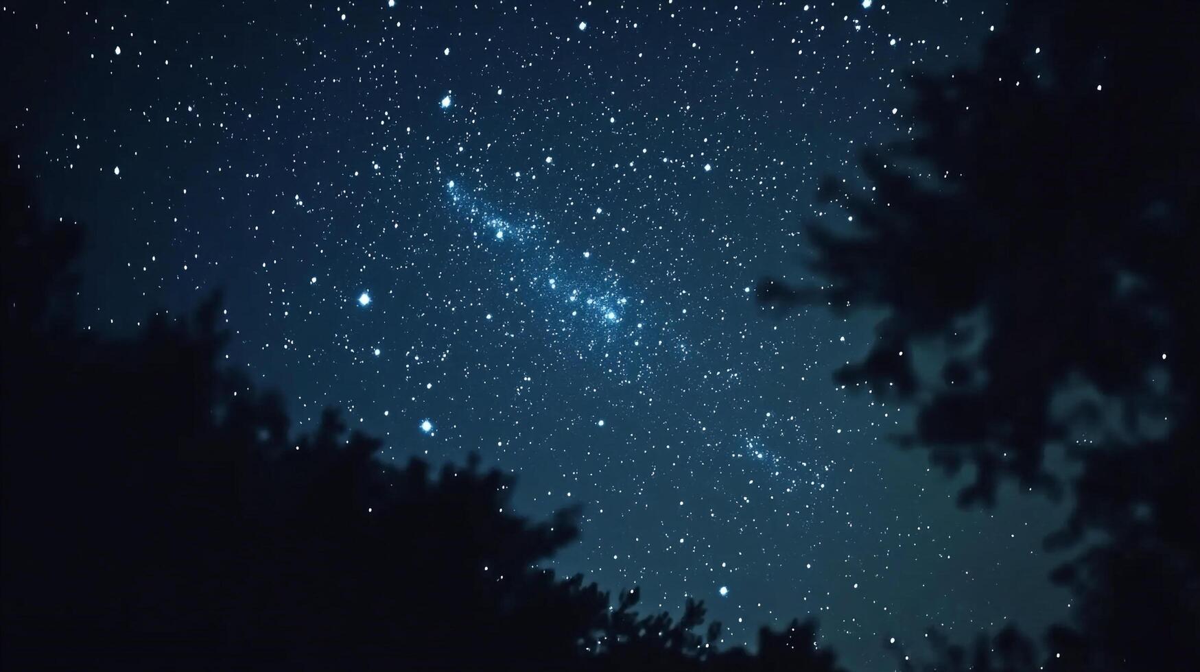 A celestial tapestry of starlight unfolds, showcasing the universe's grandeur amidst silhouetted trees, inviting quiet contemplation. photo