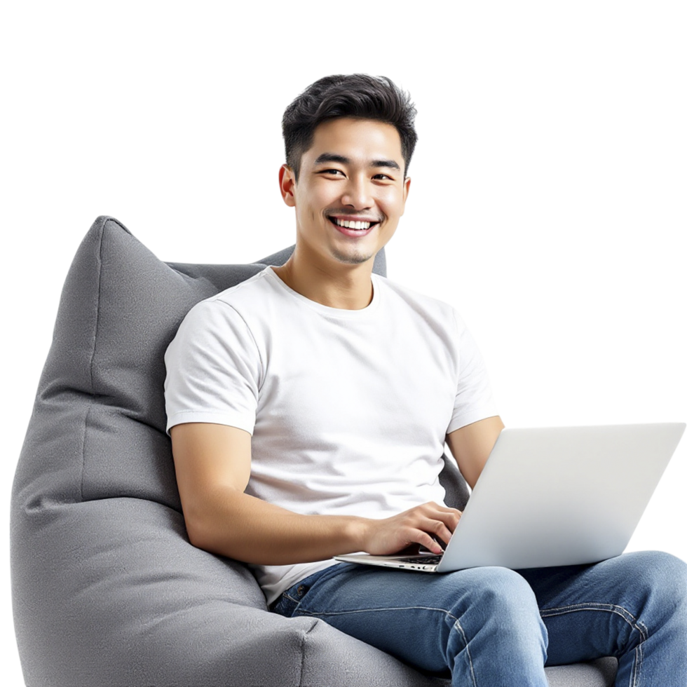 A man sitting on a bean bag chair with a laptop png