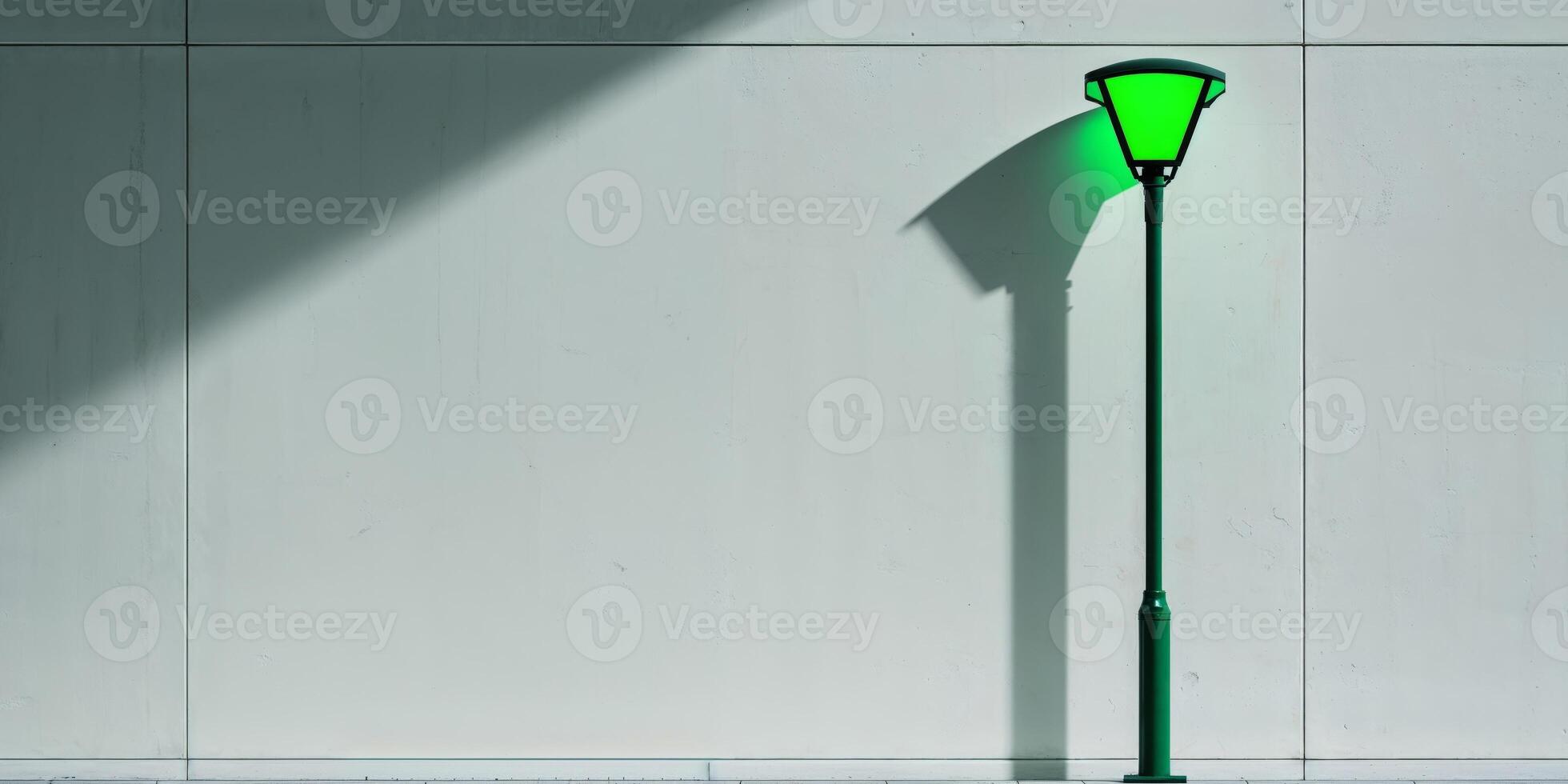A green street lamp on a wall photo