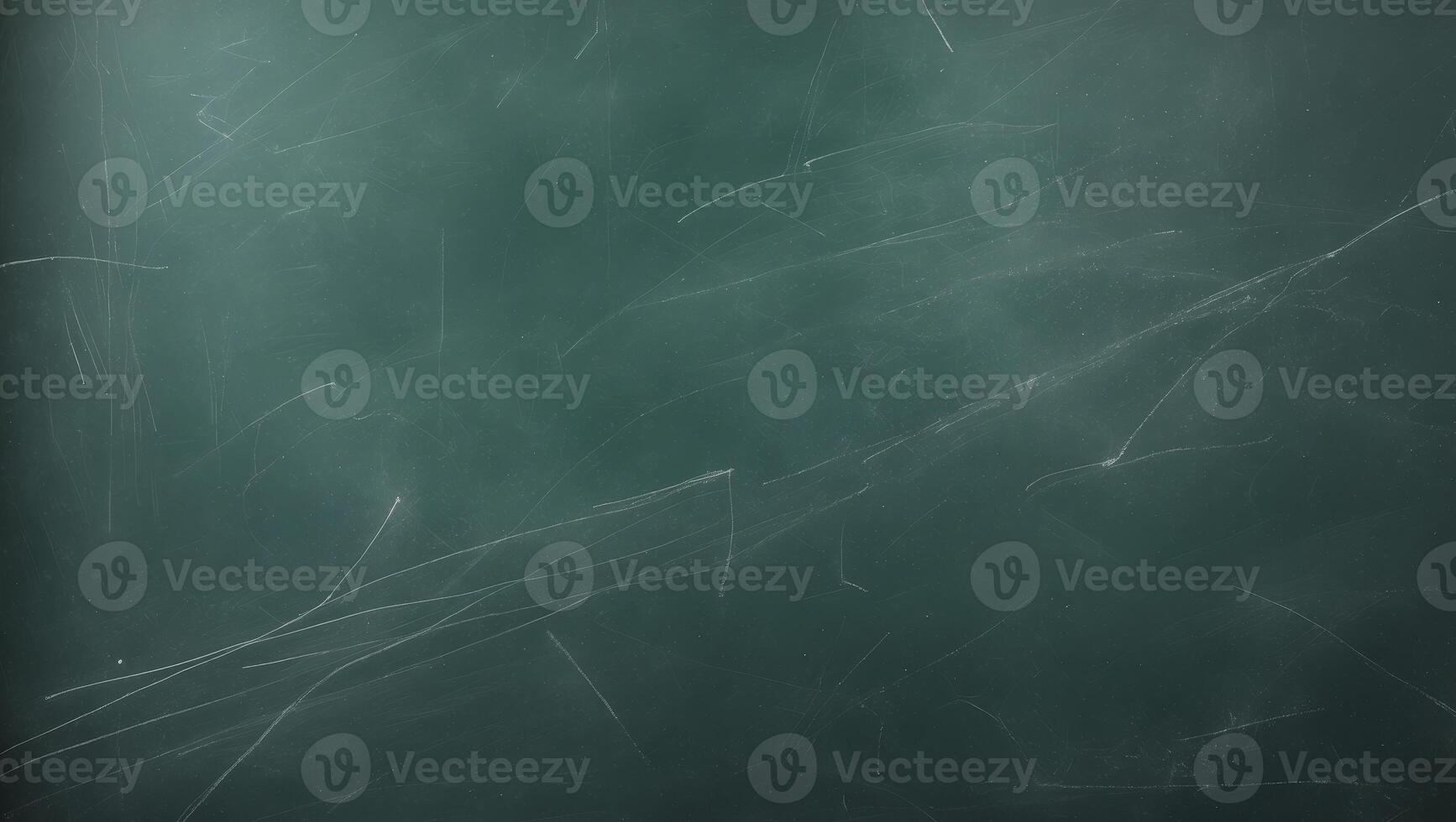 Chalkboard texture displays a dark green surface with various chalk markings photo