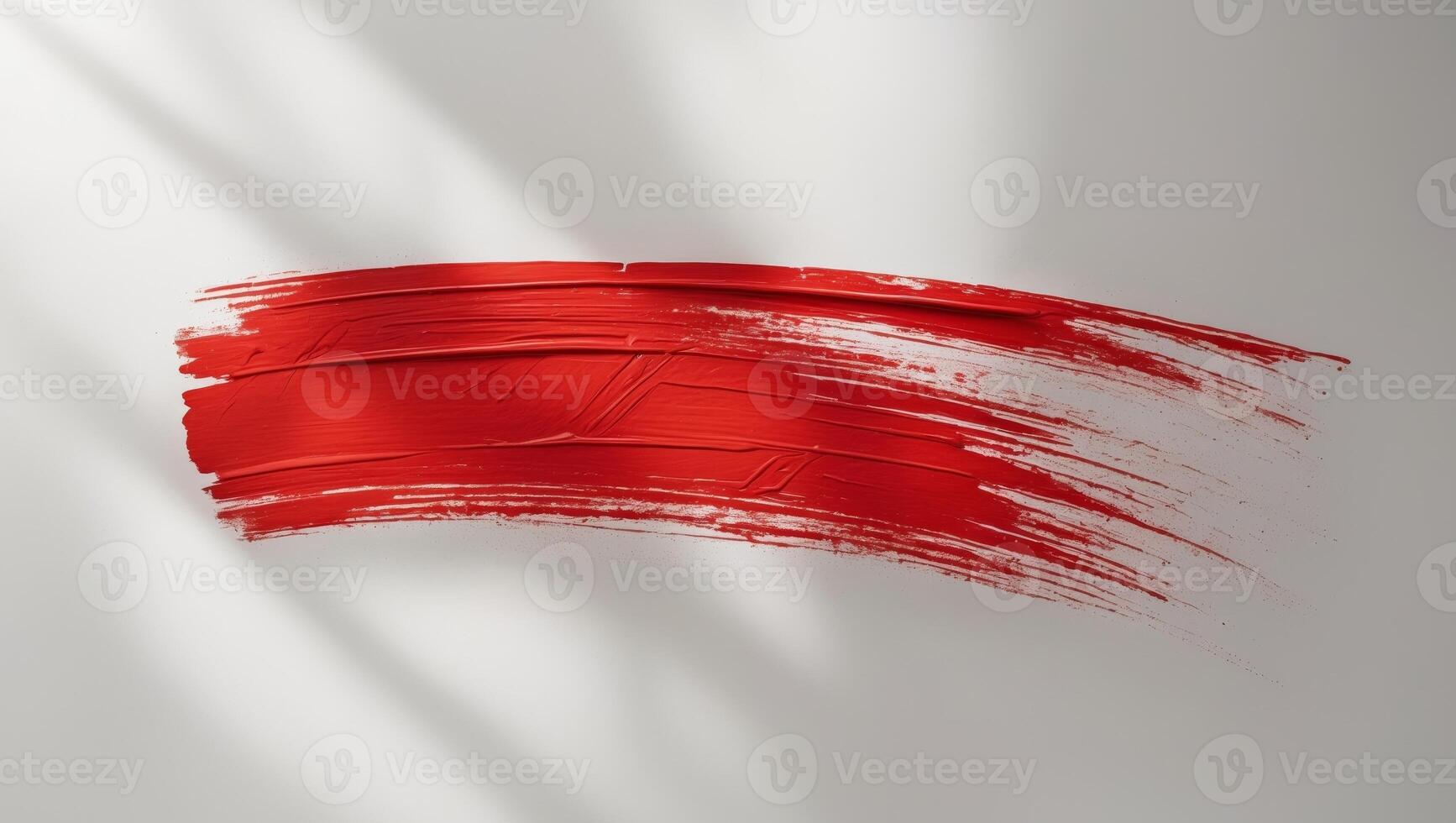 Red brushstroke creates a textured rectangular shape with visible brush marks adding a bold and energetic touch to any design. photo