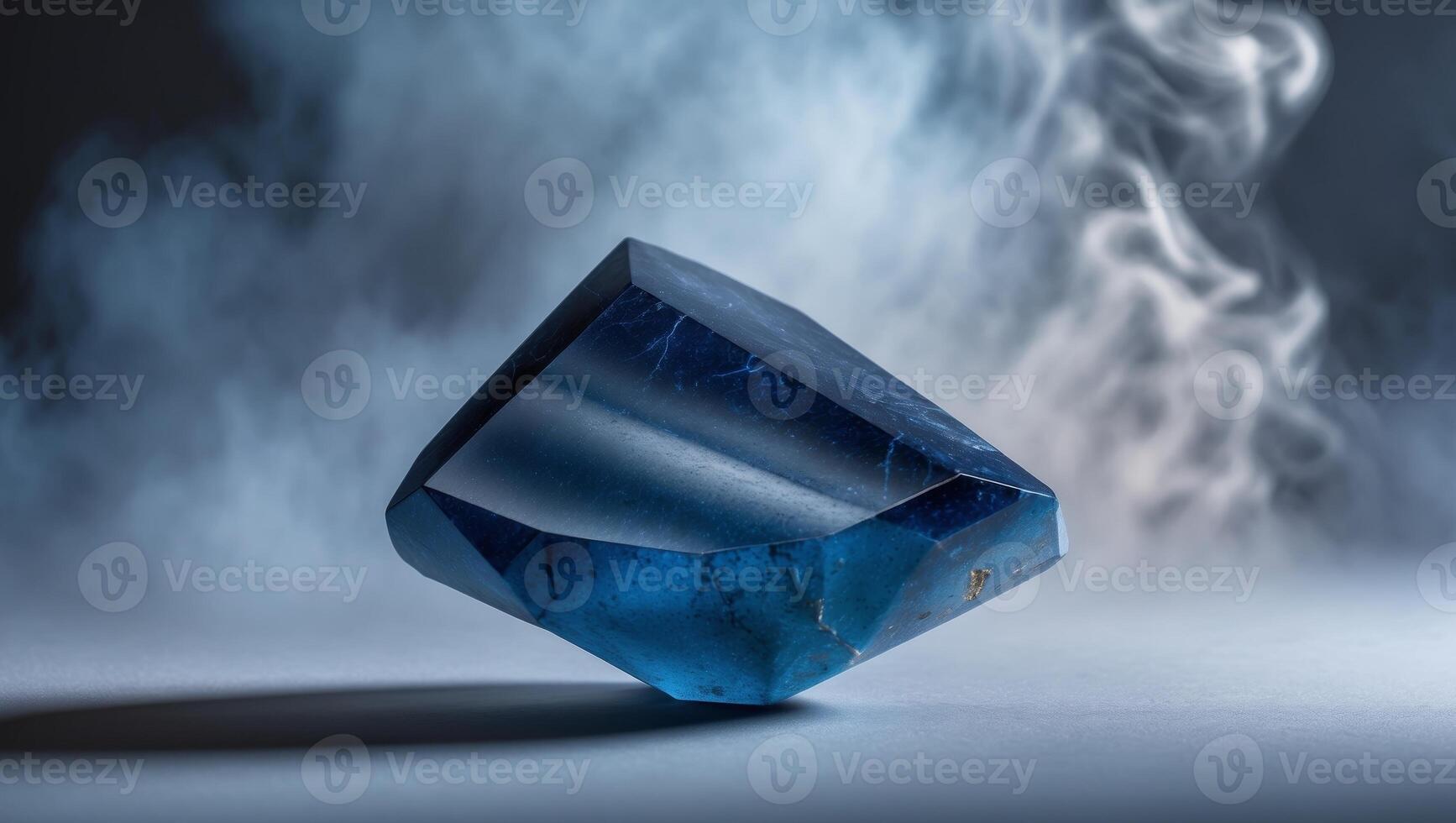A blue stone is sitting on a table with smoke photo
