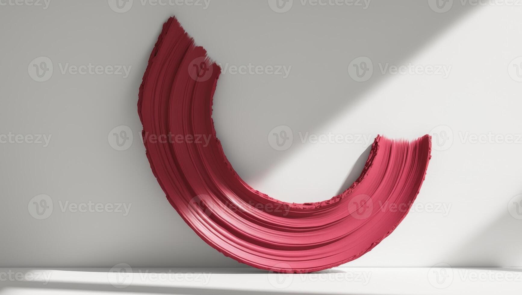 Red textured brush stroke in a semicircle shape photo
