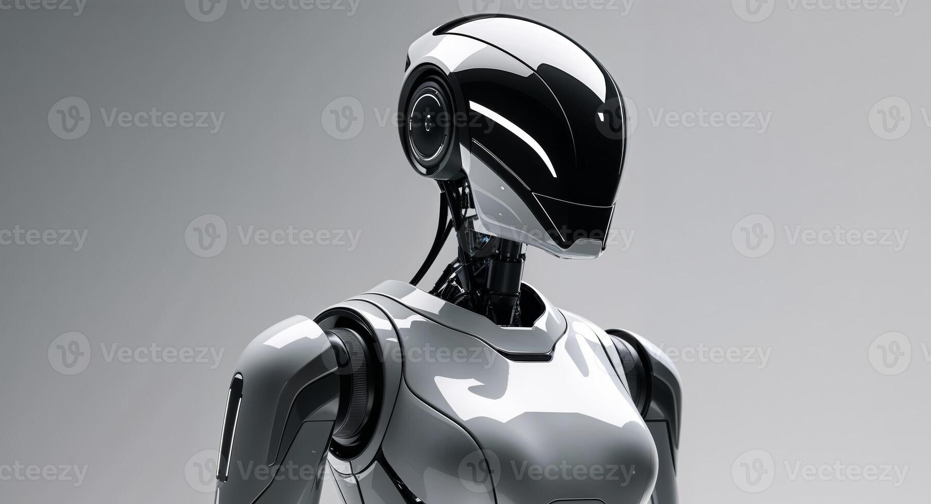 A robot is standing in front of a gray background photo