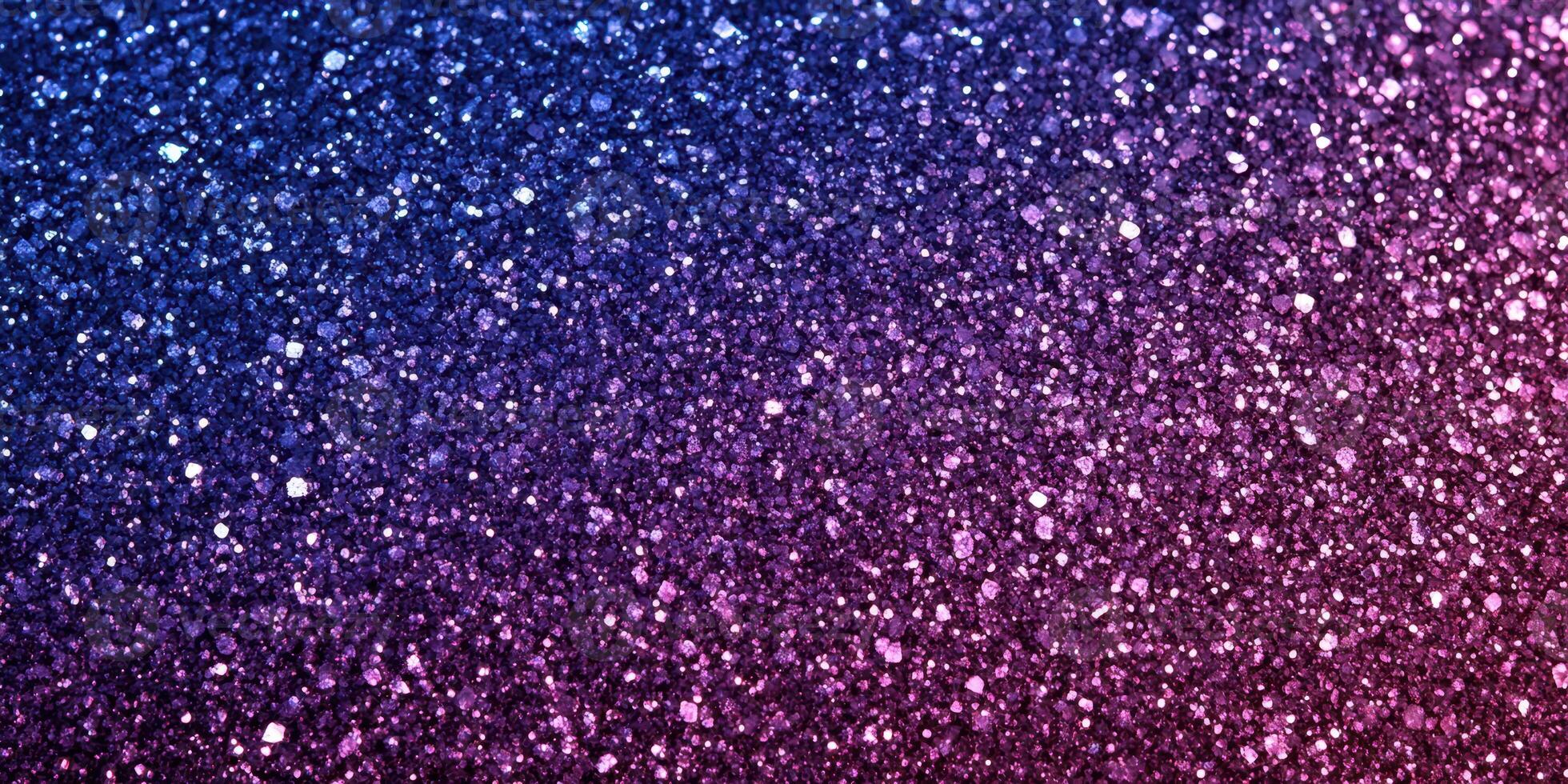 Colorful glitter particles create a mesmerizing background in shades of purple and pink photo