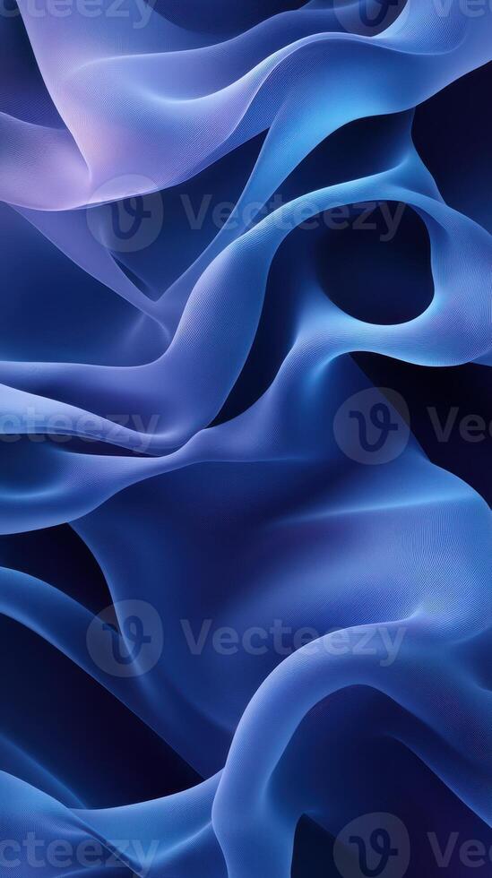 Flowing blue silk fabric drapes elegantly in soft, undulating waves creating a serene and calming atmosphere photo