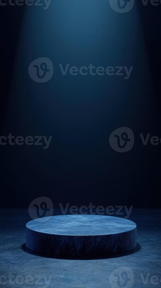 Stage illuminated by a single light beam in a dark, minimalistic space creating an atmospheric setup for performances photo