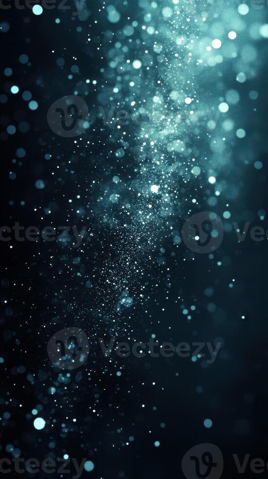 Sparkling particles create a mesmerizing effect in dark blue background during a night event photo